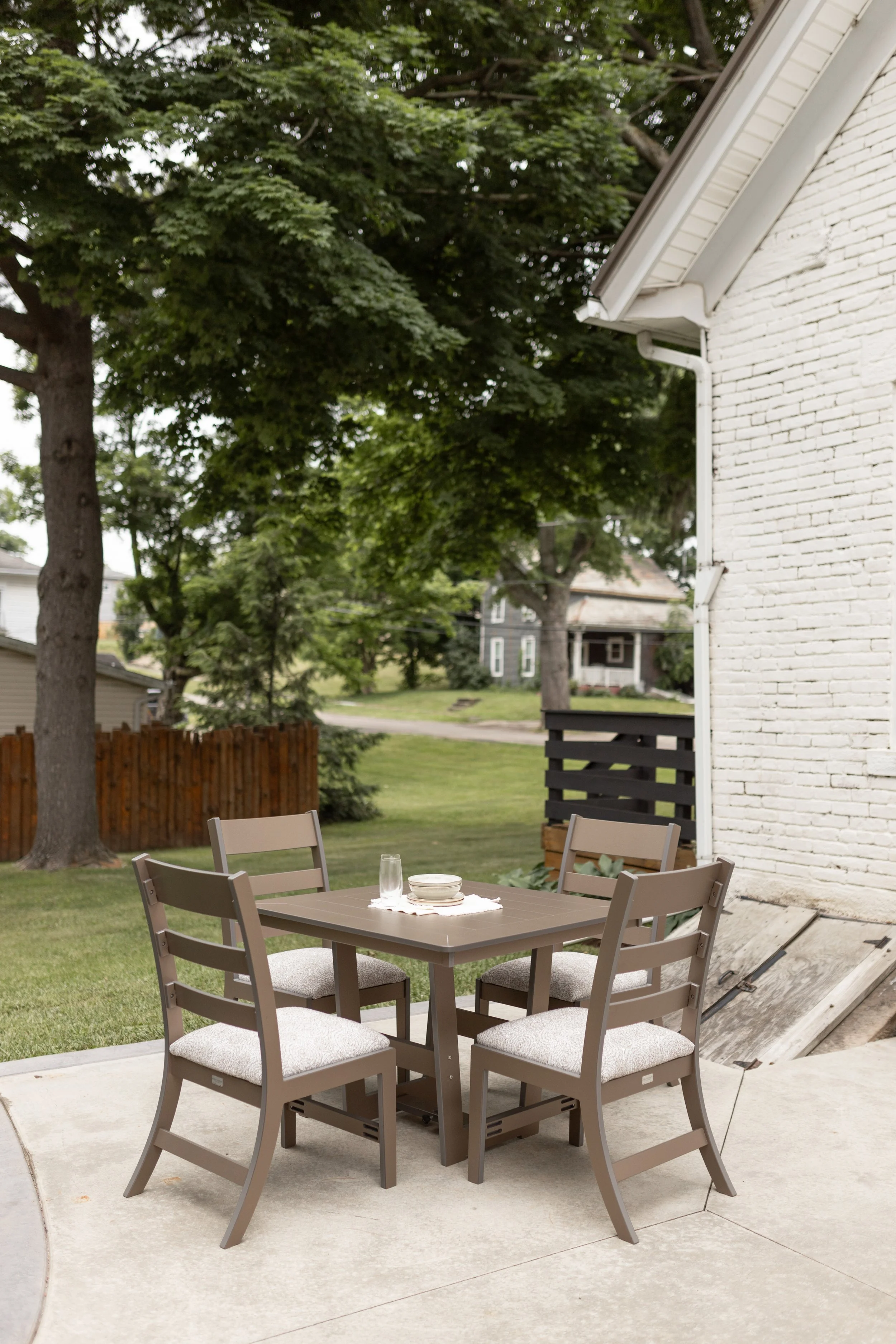 Hudson 40” Square Dining Table in Clay with Parker Chairs. Seat cushions in La La Land Sand 3.jpg