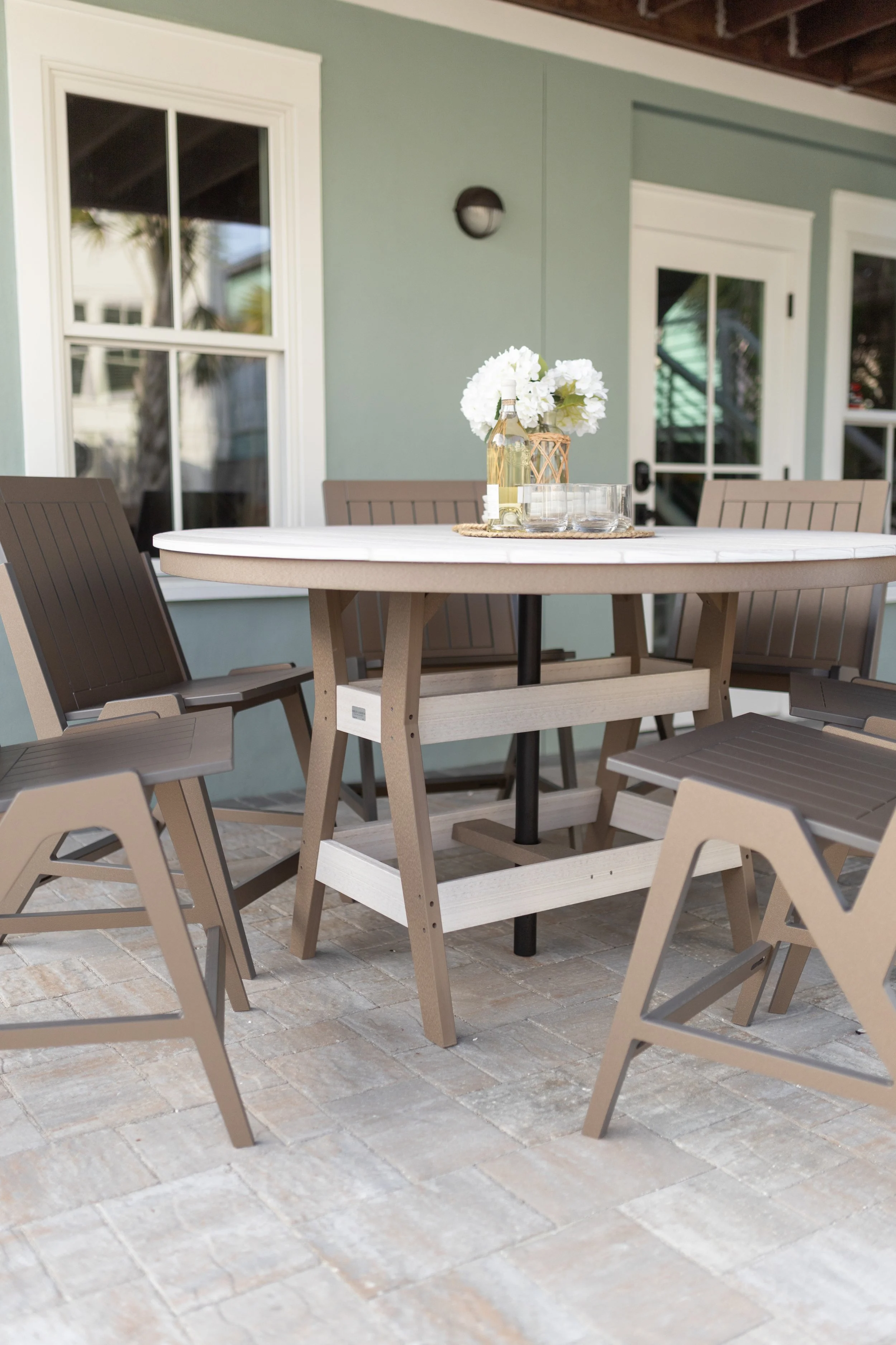 Harbor 60” Round Counter Table in Seashell on Weatherwood paired with Kinsley Counter Side Chairs in Clay.jpg