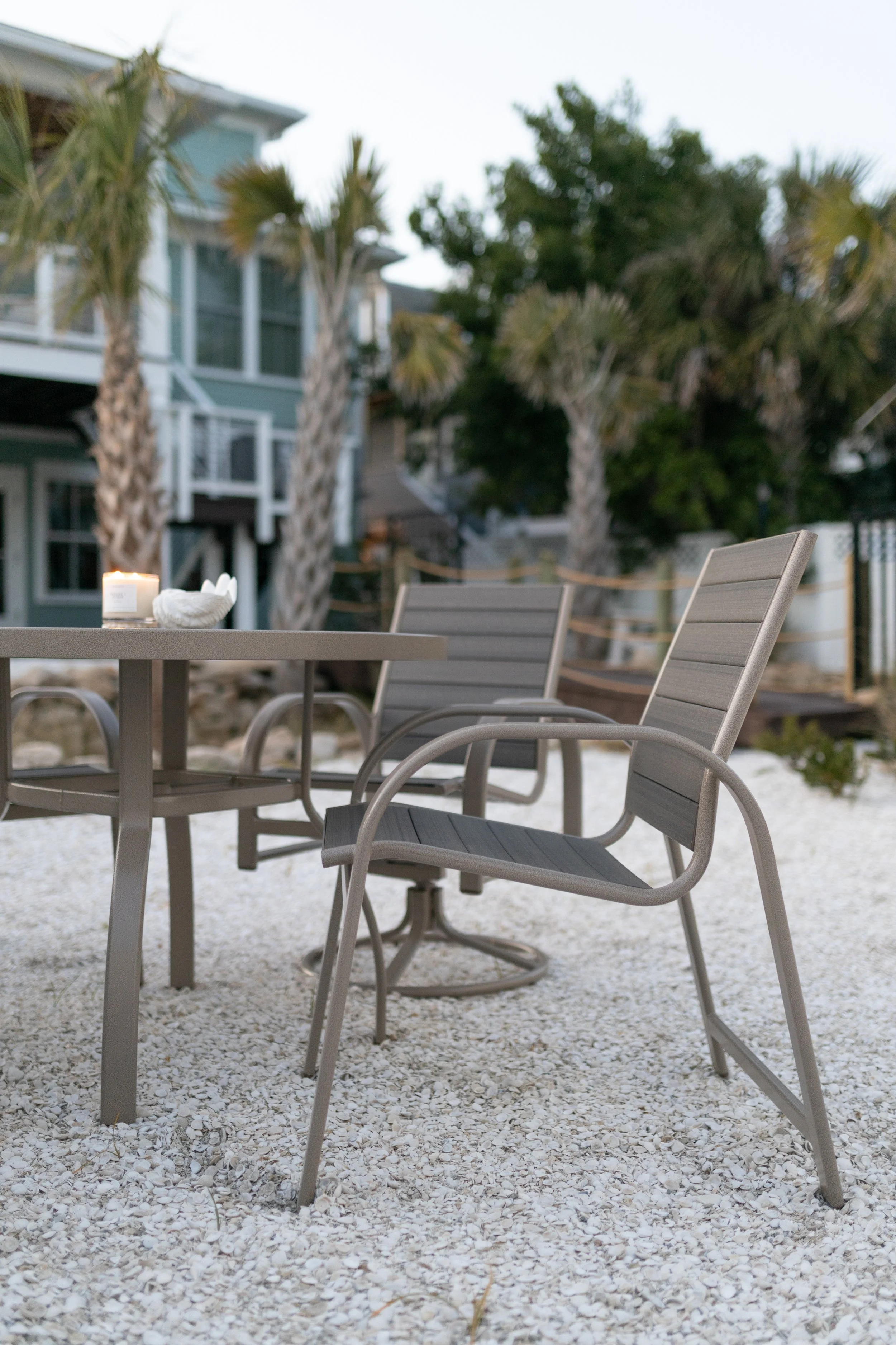 Murphy 42” Round Dining Table in Oak Wood Vein. Murphy Poly Dining Chairs and Murphy Poly Swivel Rocker Dining Chairs in Oak Wood Vein with Coastal Gray poly (4).jpg
