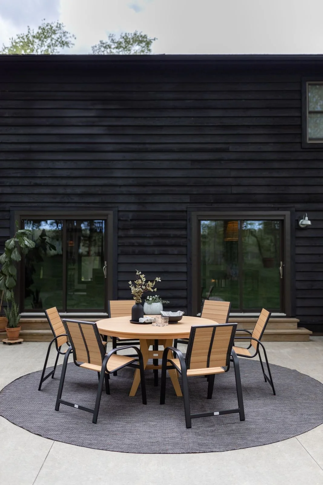 Harbor 60 Dining Table with Murphy - Natual Teak and Black (2).jpg