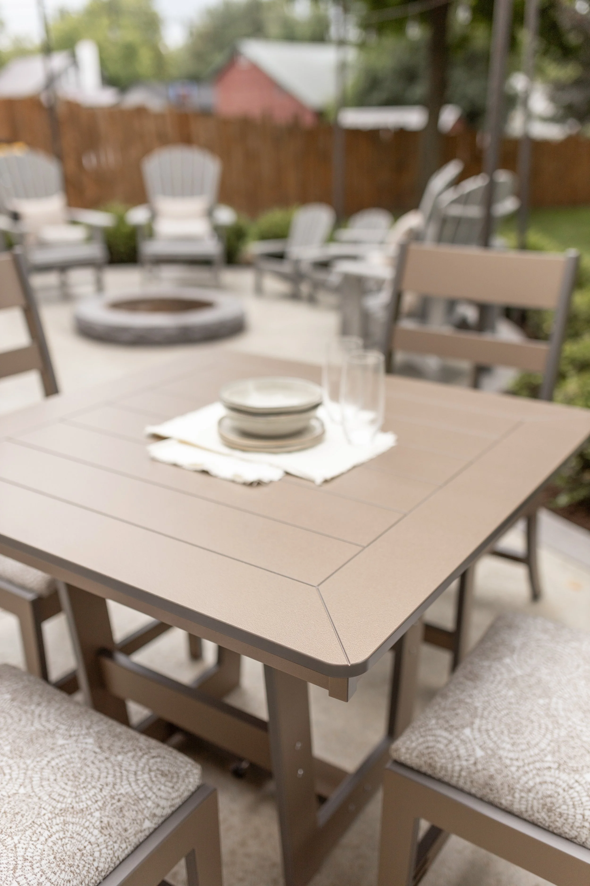 Hudson 40” Square Dining Table in Clay with Parker Chairs. Seat cushions in La La Land Sand.jpg