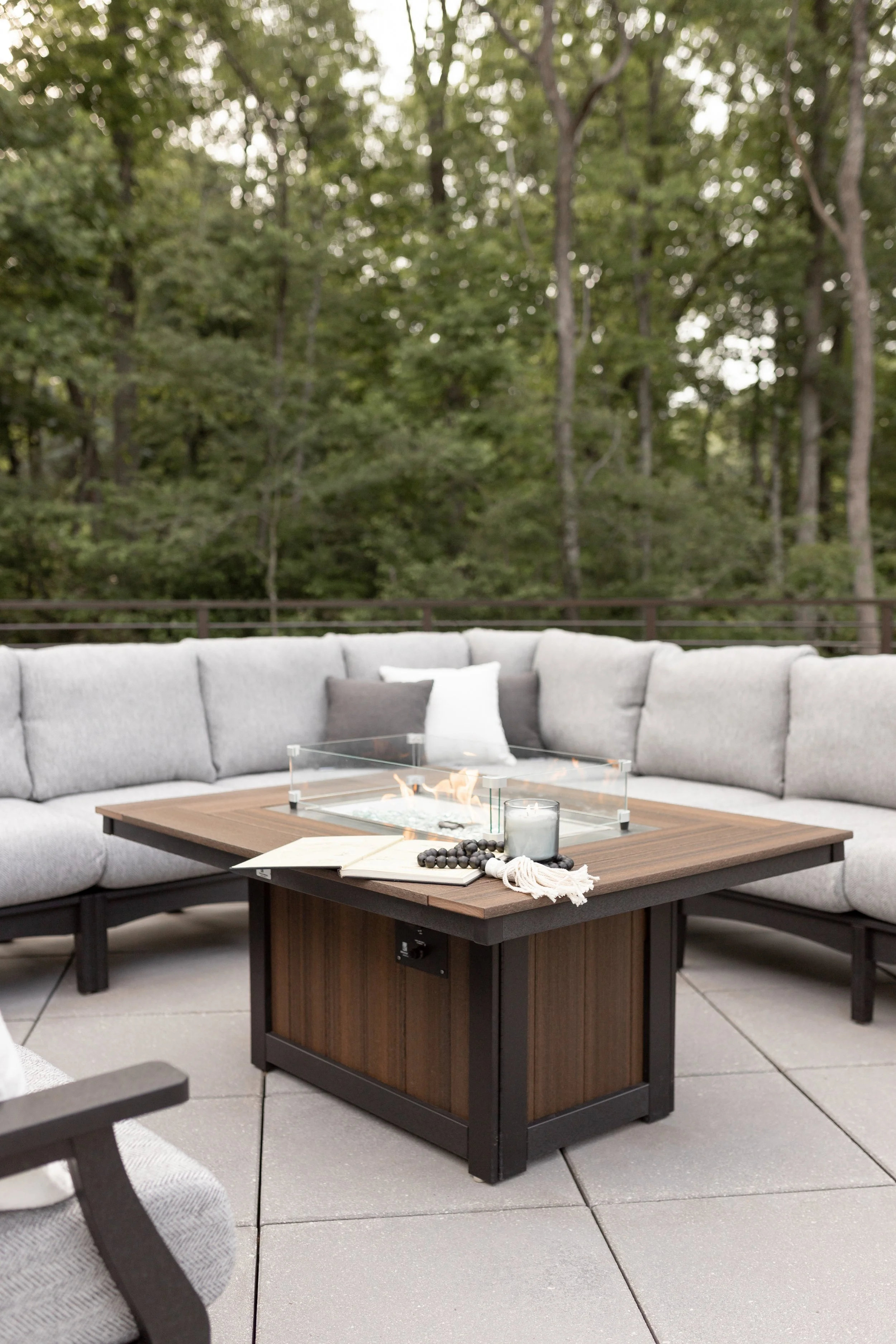 Donoma Rectangular Fire Pit in Brazilian Walnut on Black with Classic Terrace Sectional in Black. Cushions in Waterpoint Marble.jpg