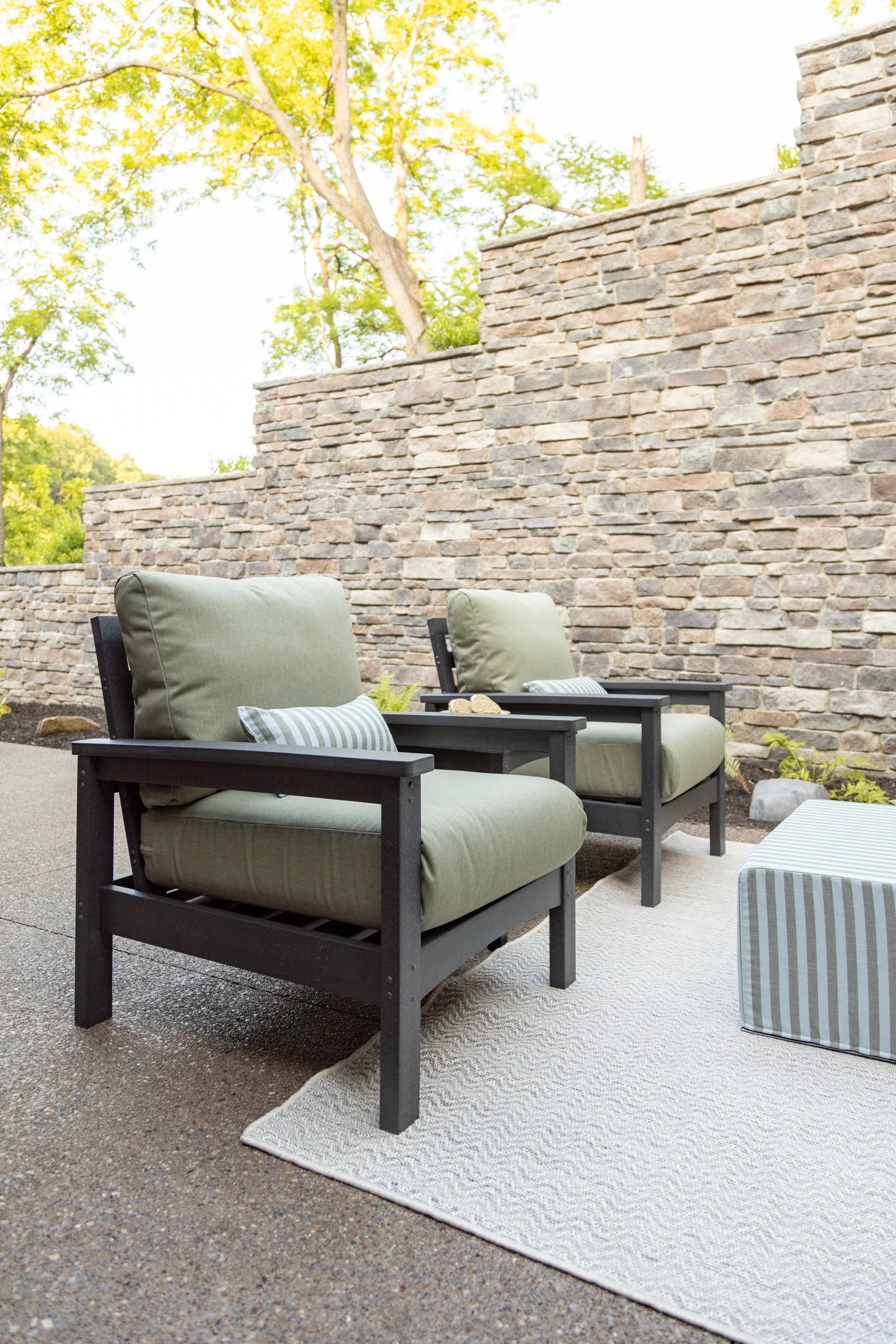 Camden Club Chairs, Camden End Table, and  in Smoke Gray. Cushions in Heritage Leaf. Lumbar pillows and LilyHive Rectangular Pouf in Sail Away.jpg