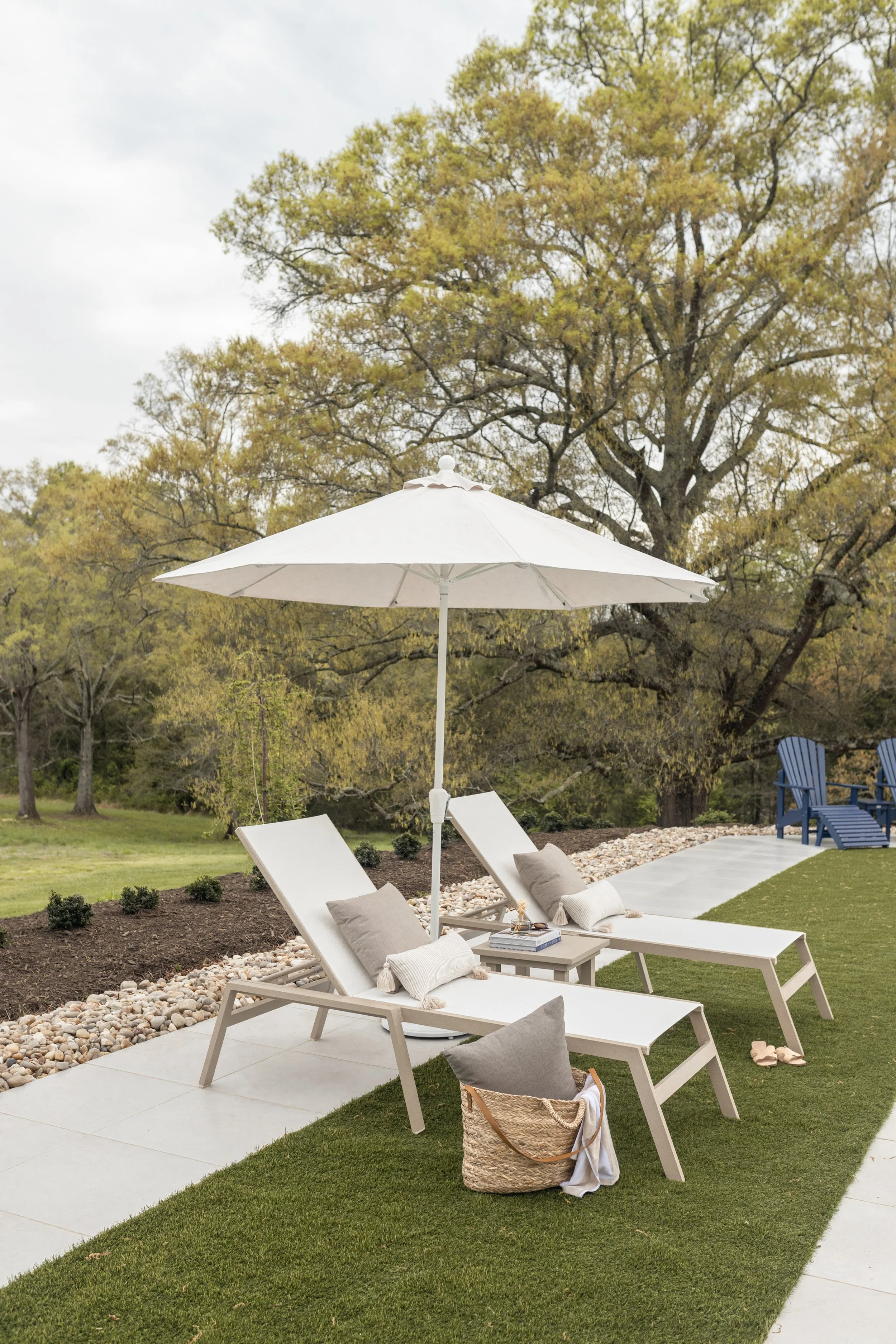 Vida Chaise Lounges and Vida Dining End Table in Sahara Speckle, sling in Sailing Salt. Throw pillows in Cast Ash. LilyHive Tasseled throw pillows in Luxe Stripe Sand.jpg