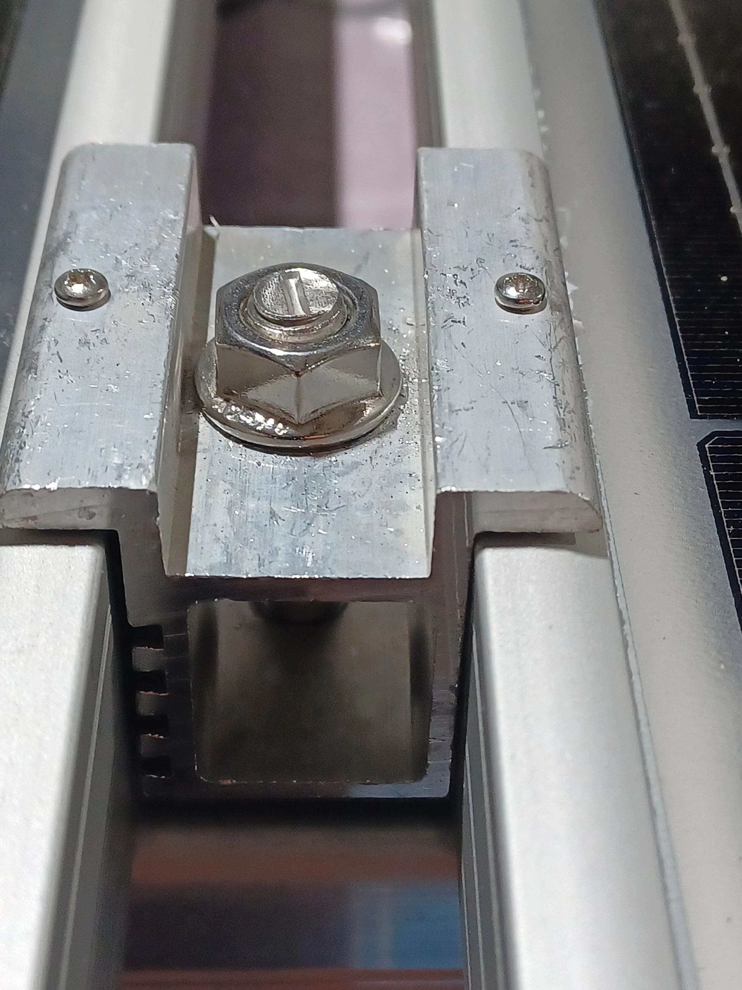 Mid Clamp between panels.jpeg