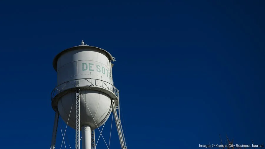 De Soto, Kansas water tower against a blue, cloudless sky
