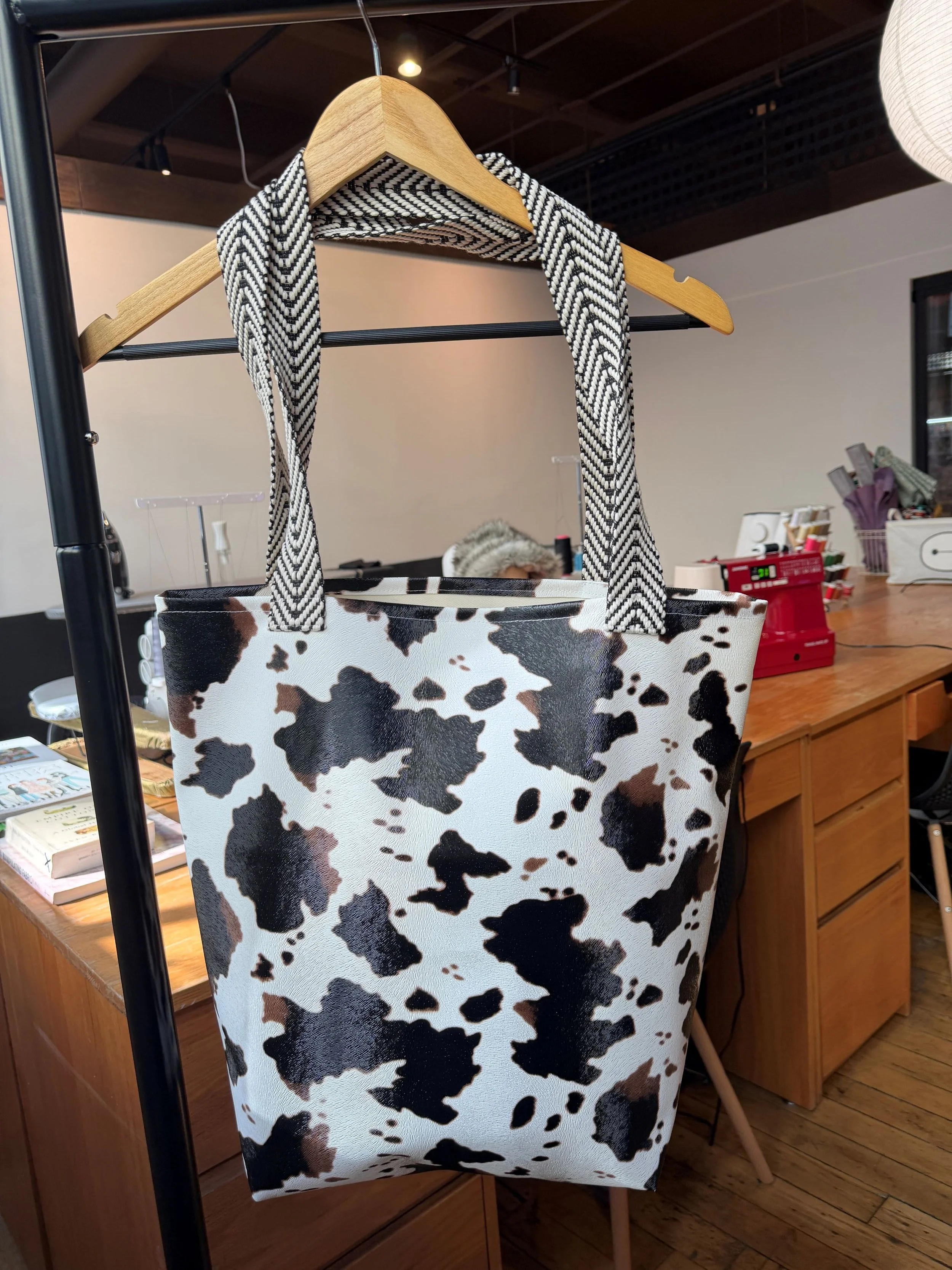 In this Ultimate Beginner sewing class students will learn basic machine operation and terminology while making their own vinyl tote bag!