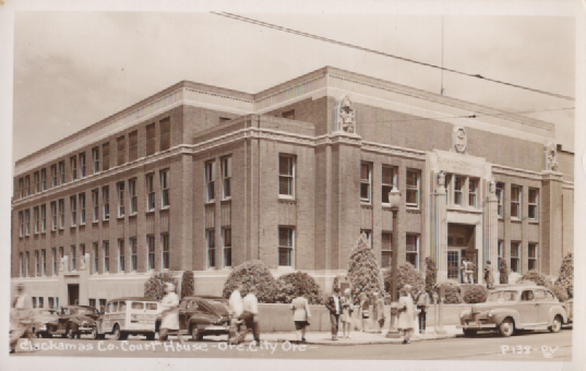 PC088  Main and 8th Streets Oregon CIty Courthouse constructed 1936-1937 to replace 1884 courthouse.  Designed in Art Deco style, 3 stories with stone surrounds, metal decorative panels, and figures with winged helmets.  No longer used for court afte