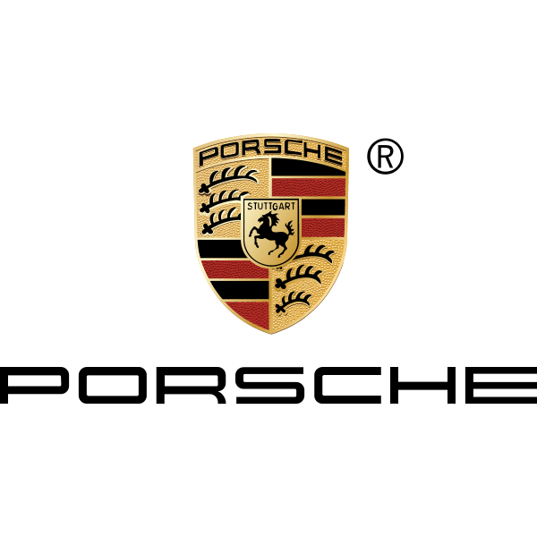 Close-up of a Porsche logo with a black background.