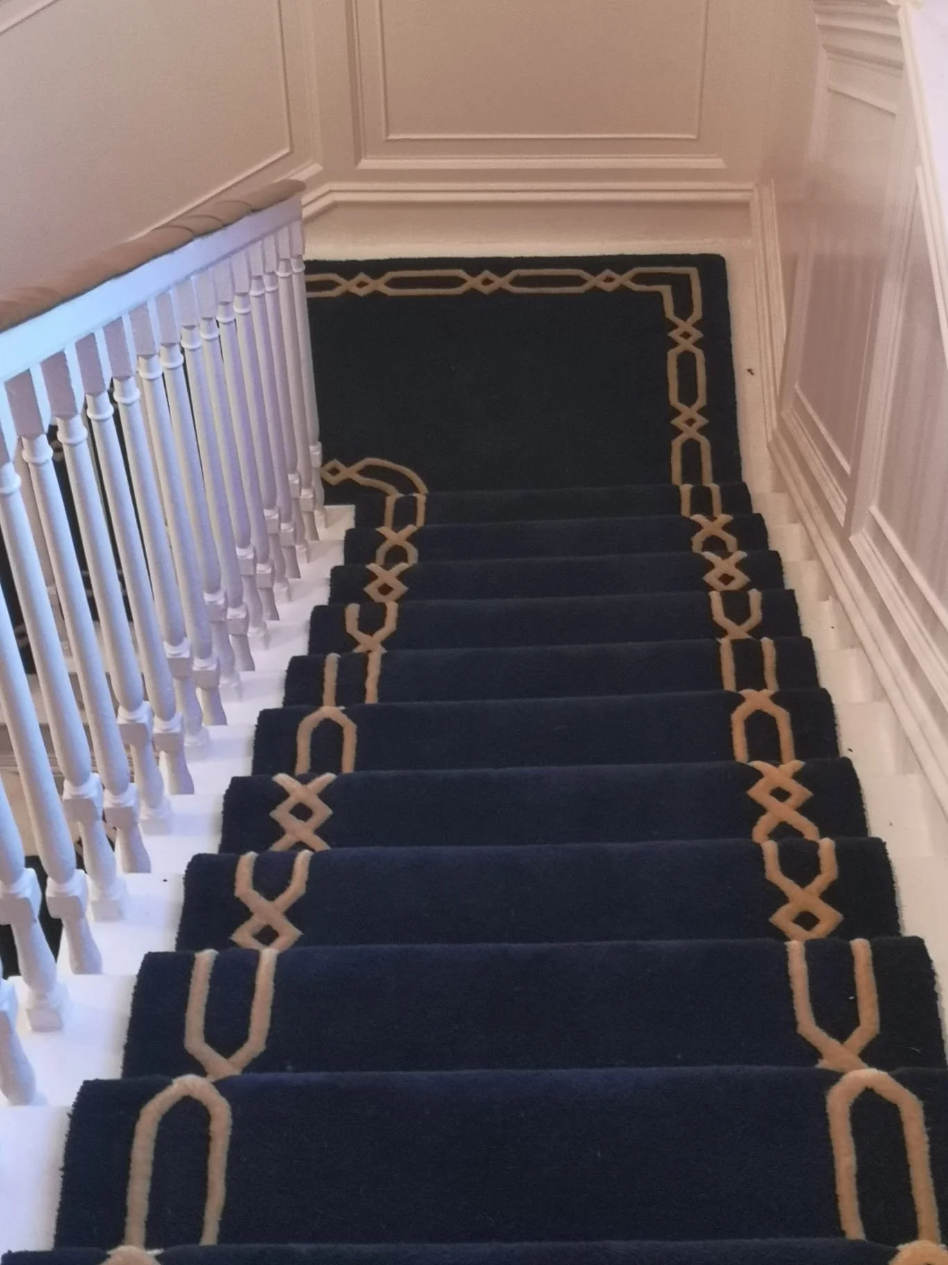 Handmade Bespoke Wool Carpet with border inlay detail