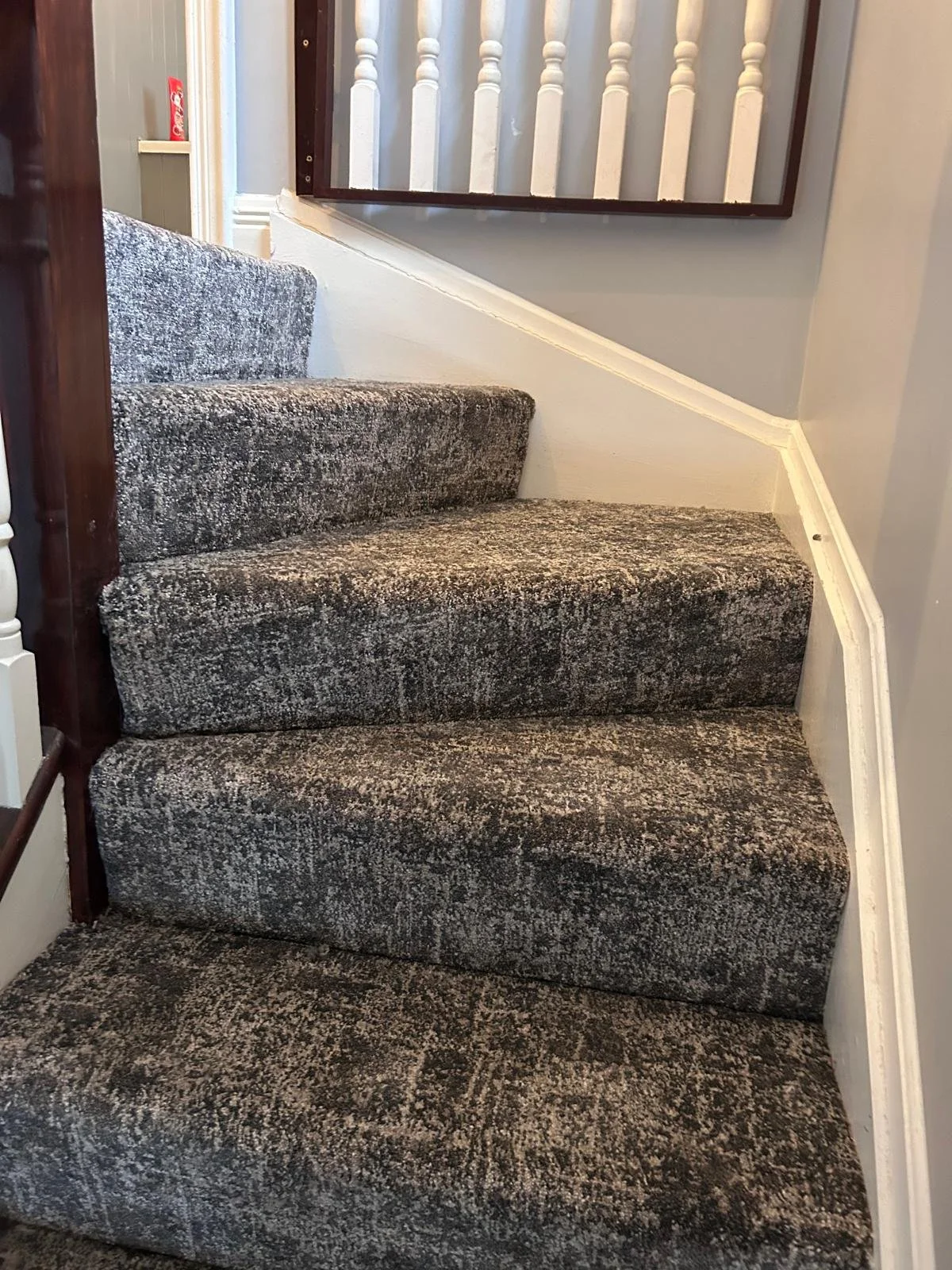 Stairs carpet with woven wilton carpet in a graphic design pattern