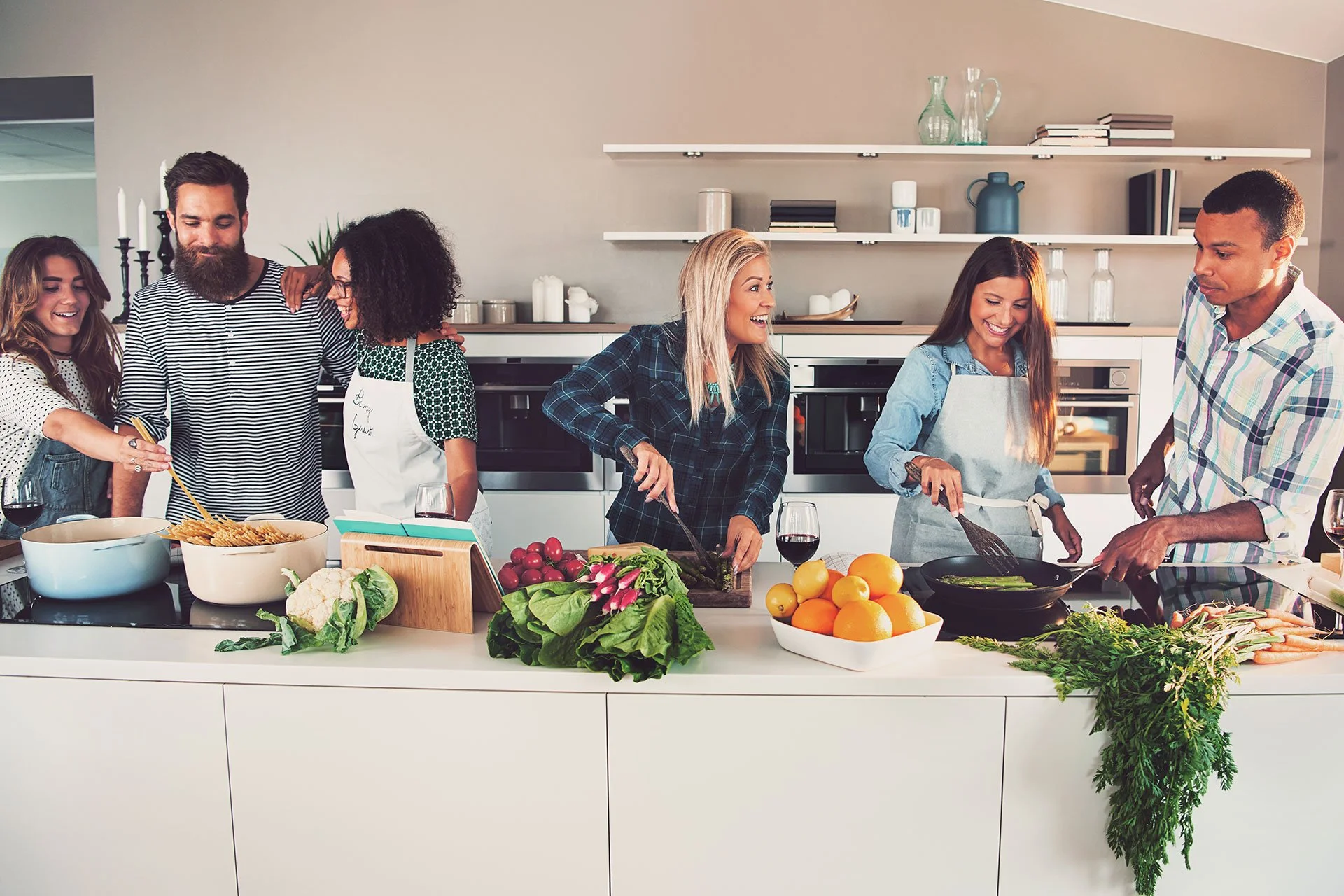 six-mixed-black-and-caucasian-friends-cooking-food-2022-02-02-05-04-55-utc.jpg