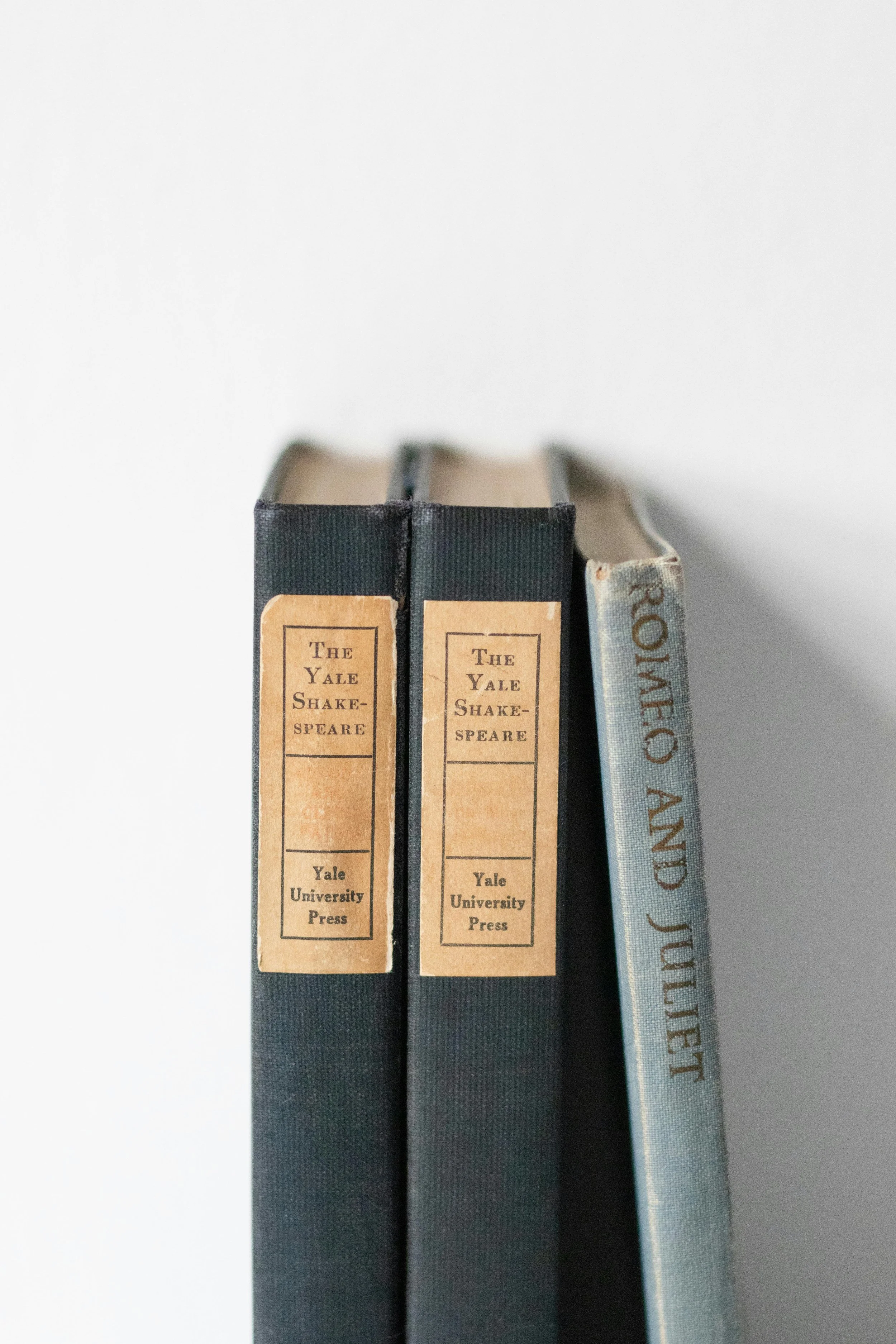 Close-up of three books to represent the English exam board set texts that are studied for GCSE and A-Level public examinations in English Literature and English Language.