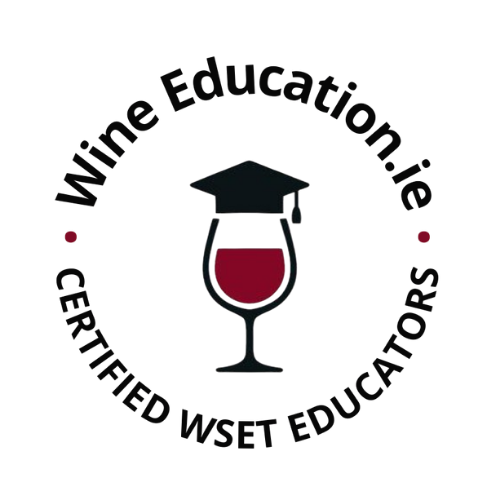 Logo with a wine glass wearing a graduation cap, surrounded by the text 'Wine Education' and 'Certified WSET Educator'.