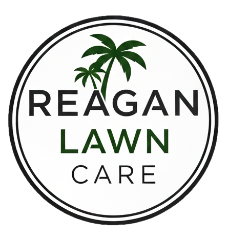 Logo for Reagan Lawn Care with palm trees above the company name.
