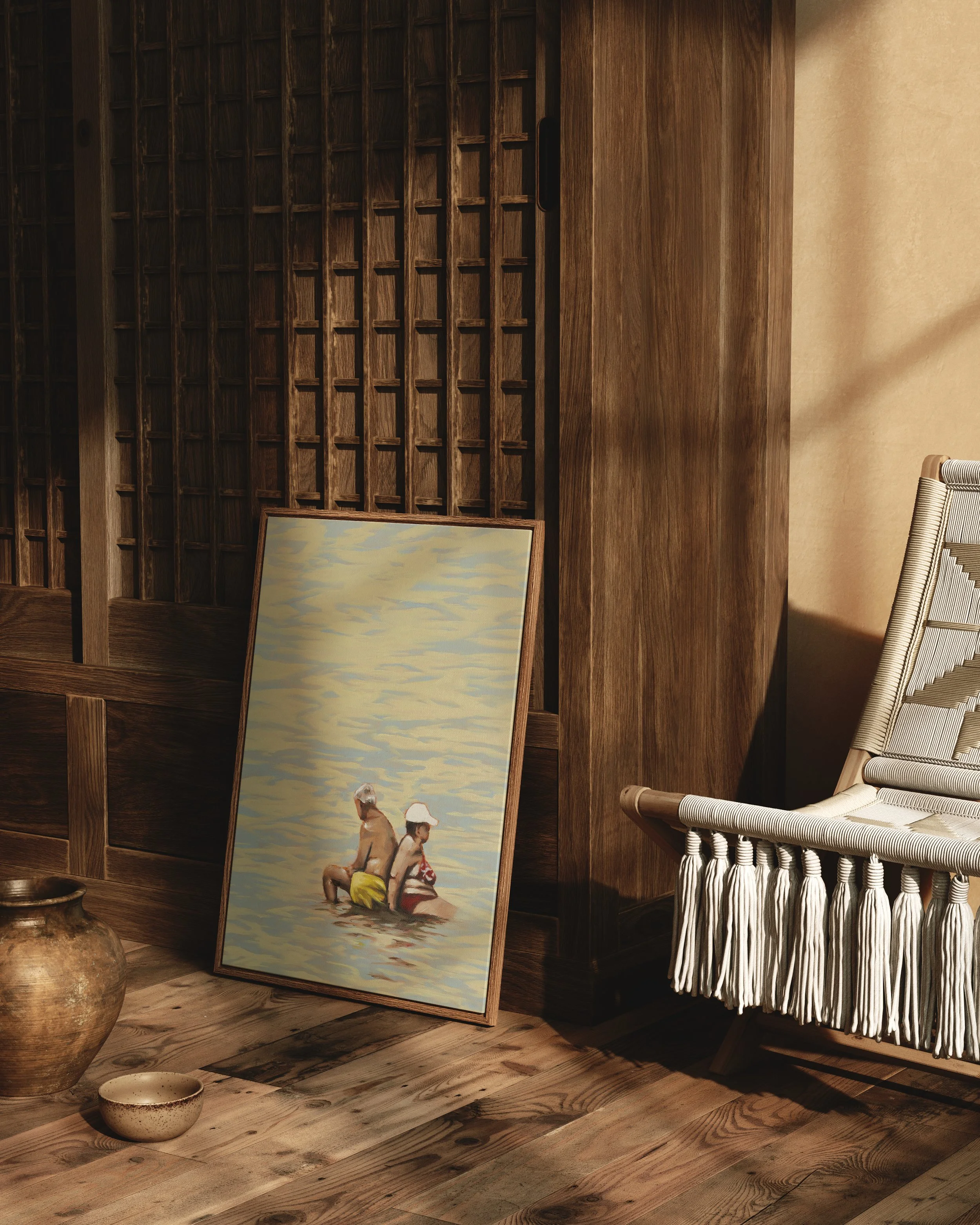 A framed painting of an older couple sitting in shallow water at the beach, with a wooden wall and woven chair in the background. Original Oil Painting by Sadie T. Shirts C., Sad the Shop.