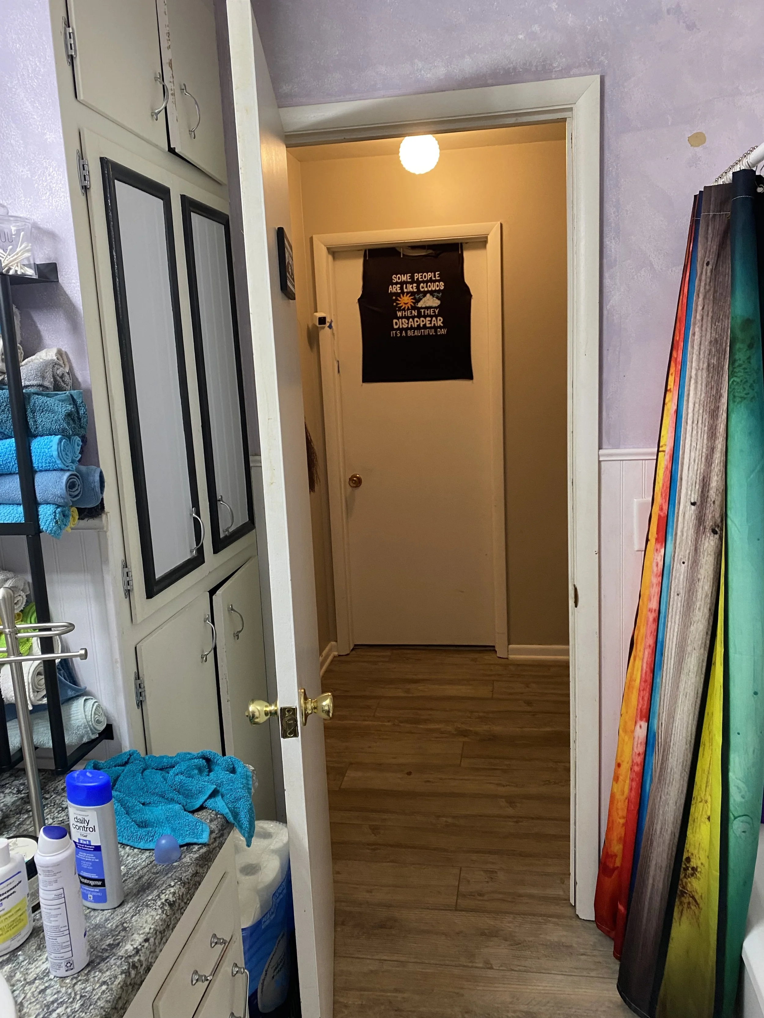 Shirt and Camera outside Bathroom 