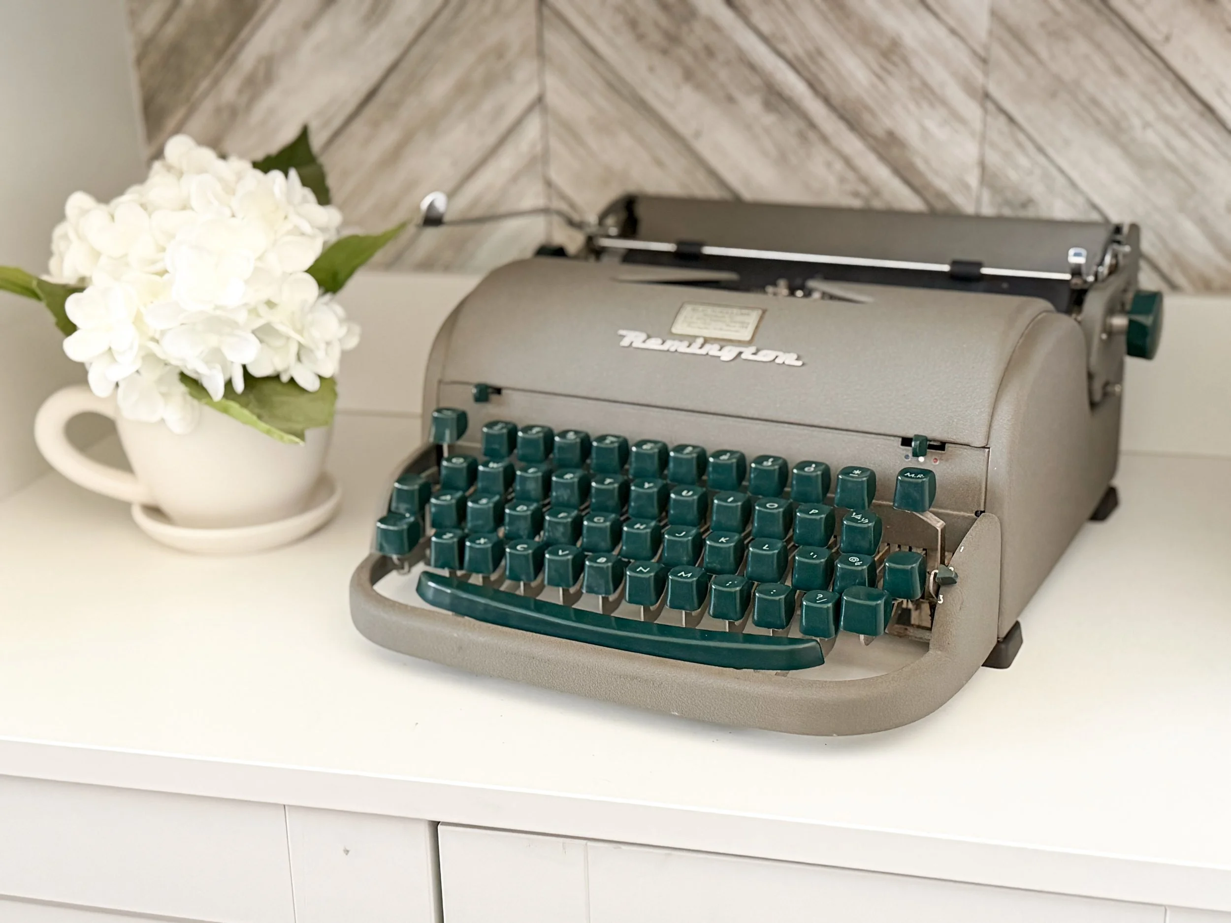 Professional office workspace with typewriter representing healthcare administrative and credentialing services
