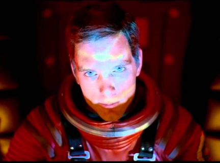 Person in a space suit with a red background.