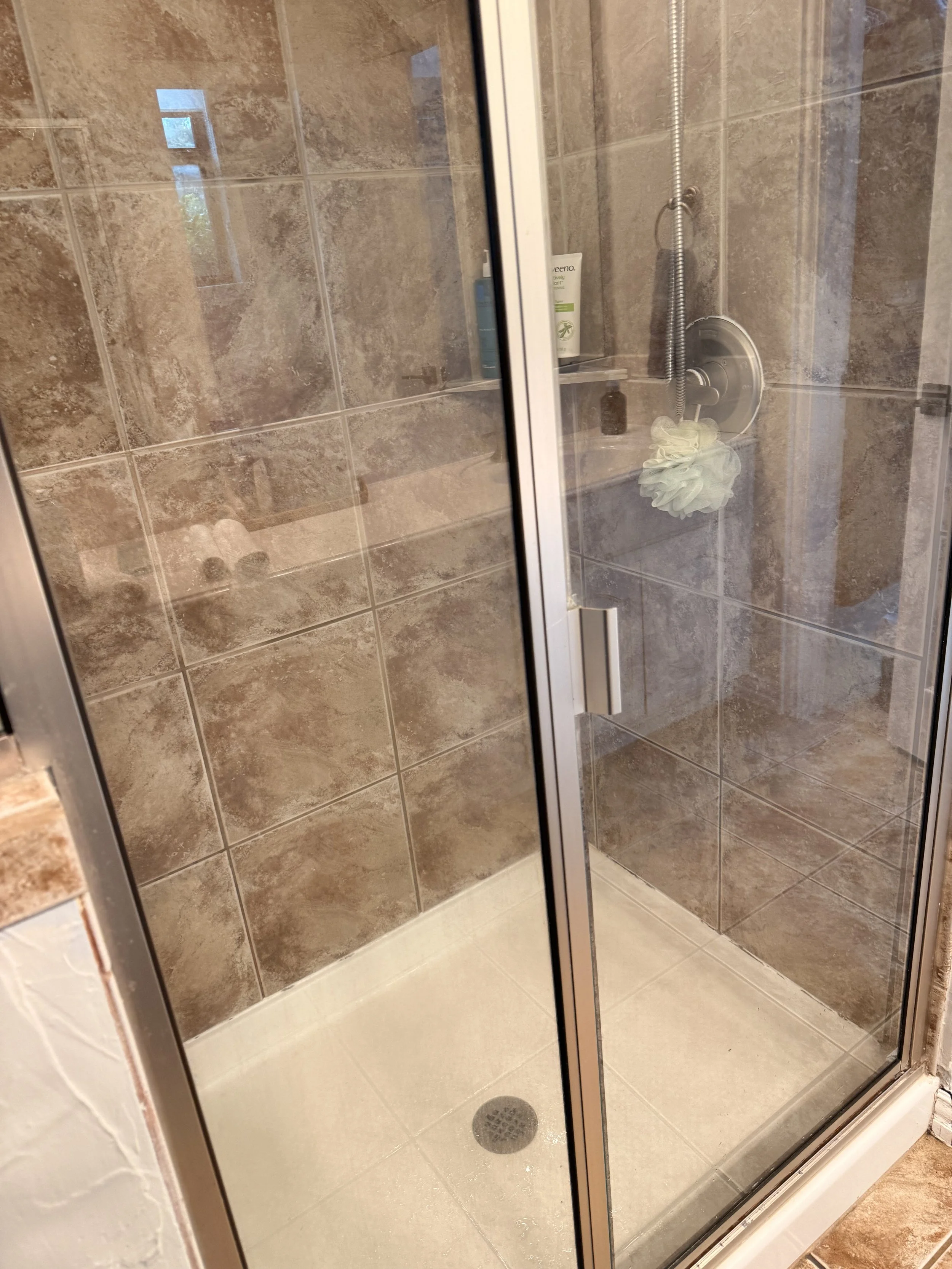 Clean glass shower after residential deep cleaning in Anna, TX