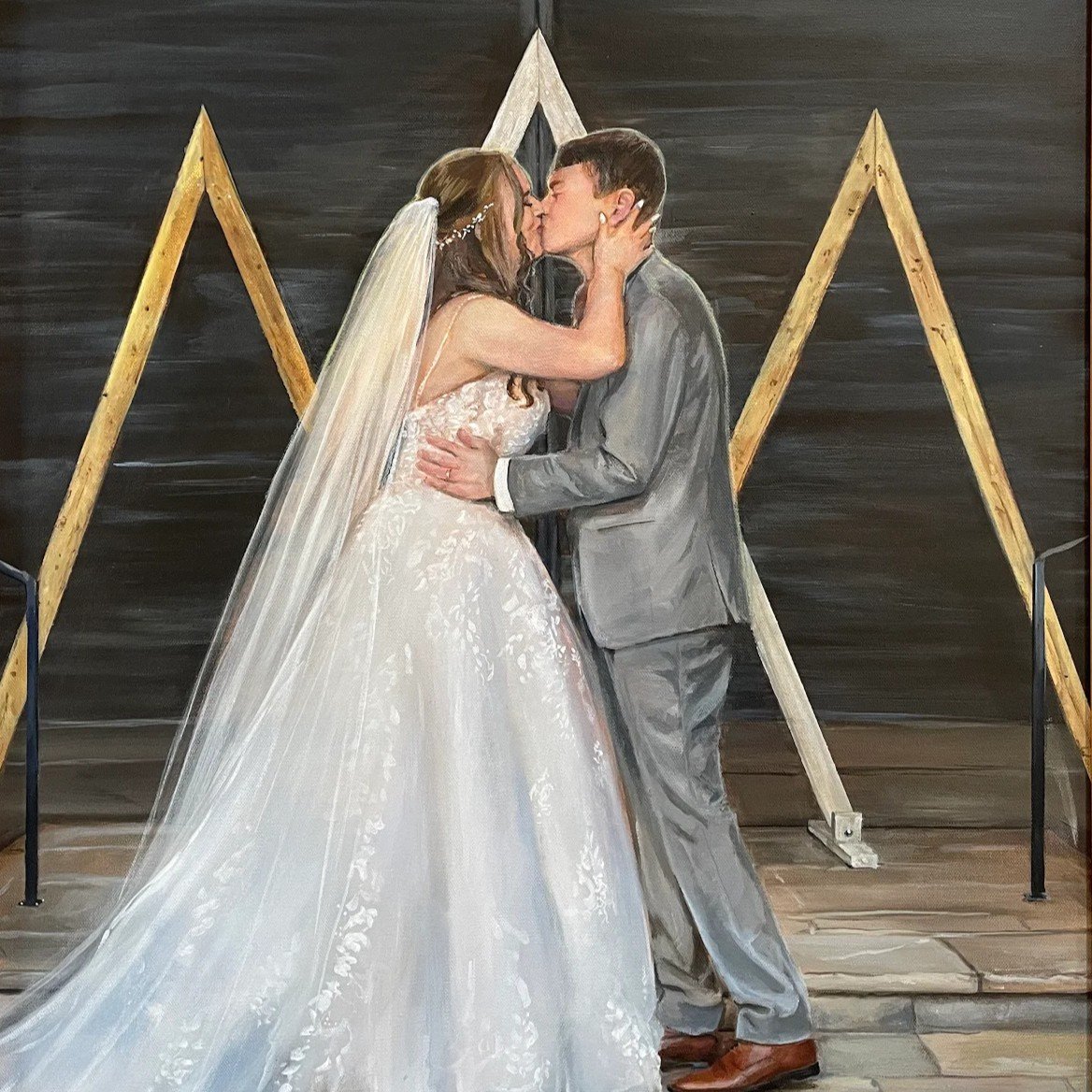 A painting of a bride and groom kissing on their wedding day, with the bride in a white wedding dress and veil, and the groom in a gray suit, standing in front of a wooden backdrop with a large white mountain-shaped decoration.