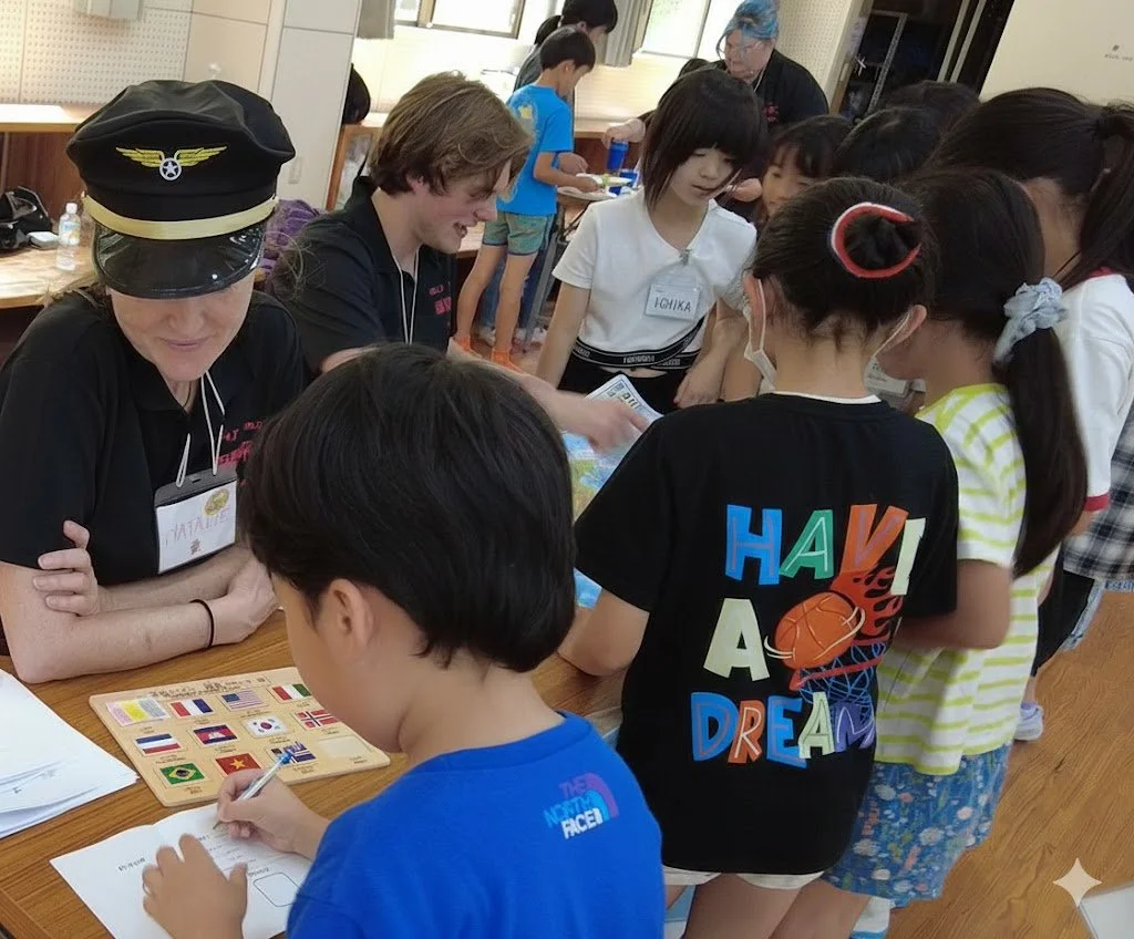 Intern interacting with Japanese school children in simulated travel agency.