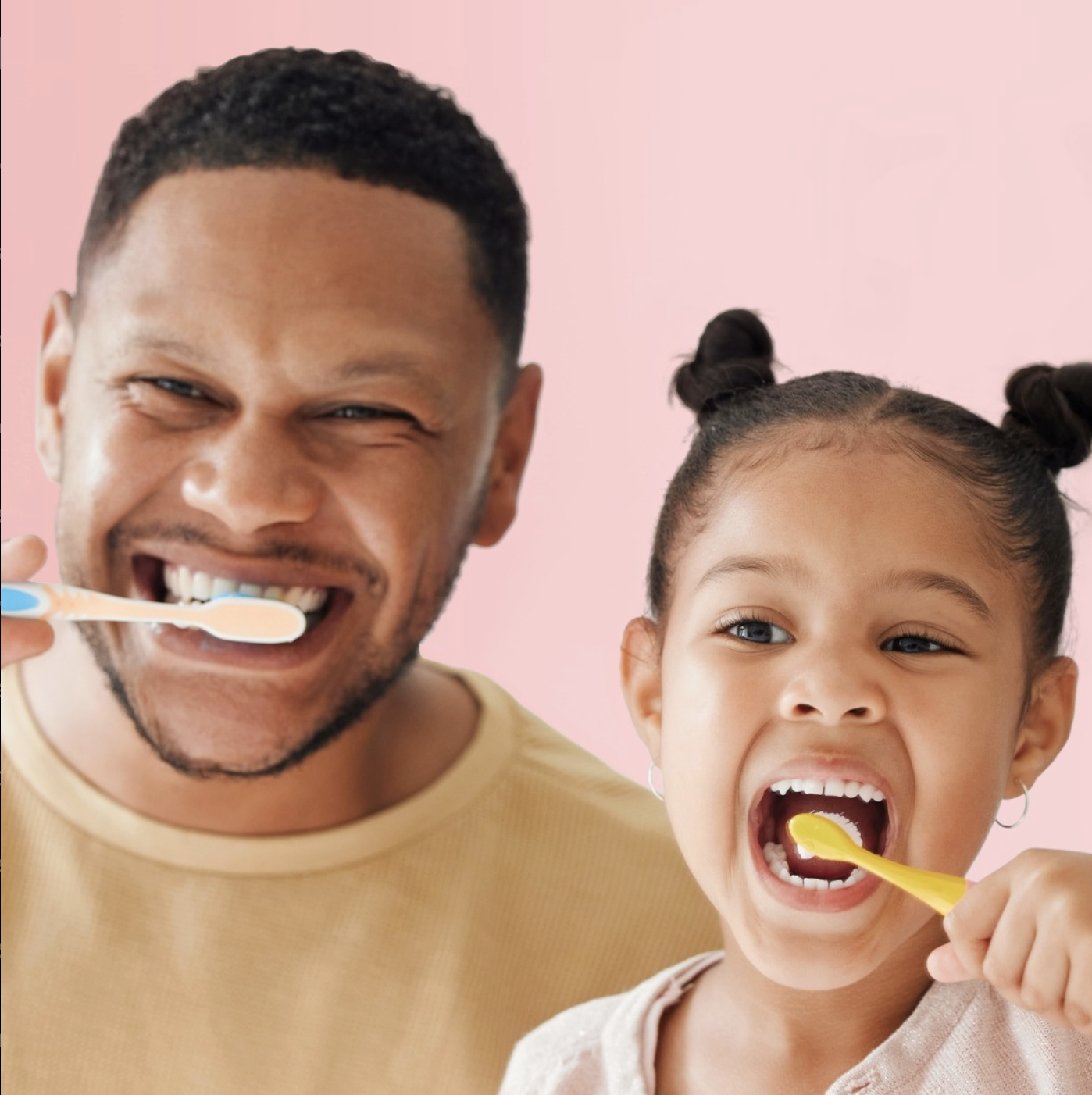 A man and a young girl smiling and brushing their teeth with colorful toothbrushes against a pink background.