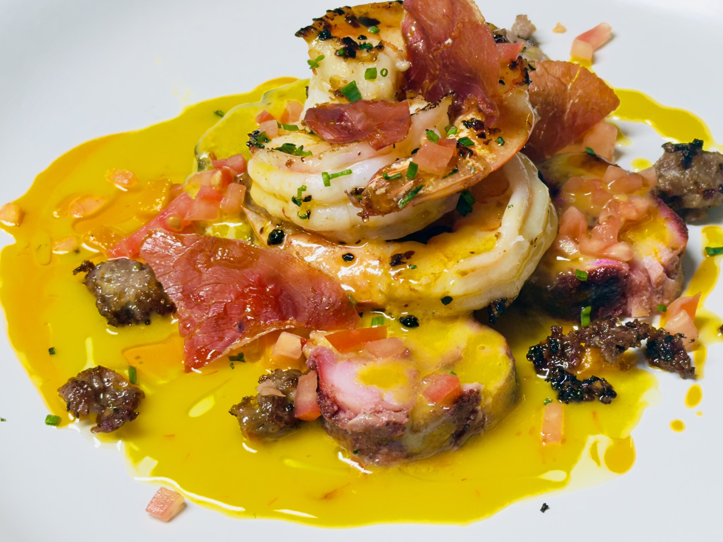 Cod medallions with sausage shrimp & saffron beurre blanc 1.jpg