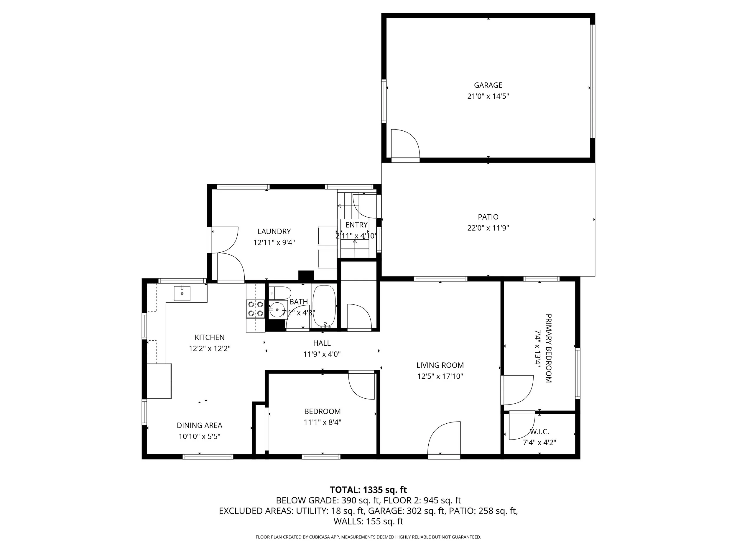 Floor plan of a house, showing rooms including kitchen, dining area, laundry, bathroom, two bedrooms, living room, primary bedroom with walk-in closet, hall, entry, garage, patio, and carport.