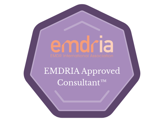 EMDRIA Approved Consultant badge with purple hexagon background and orange and white text.