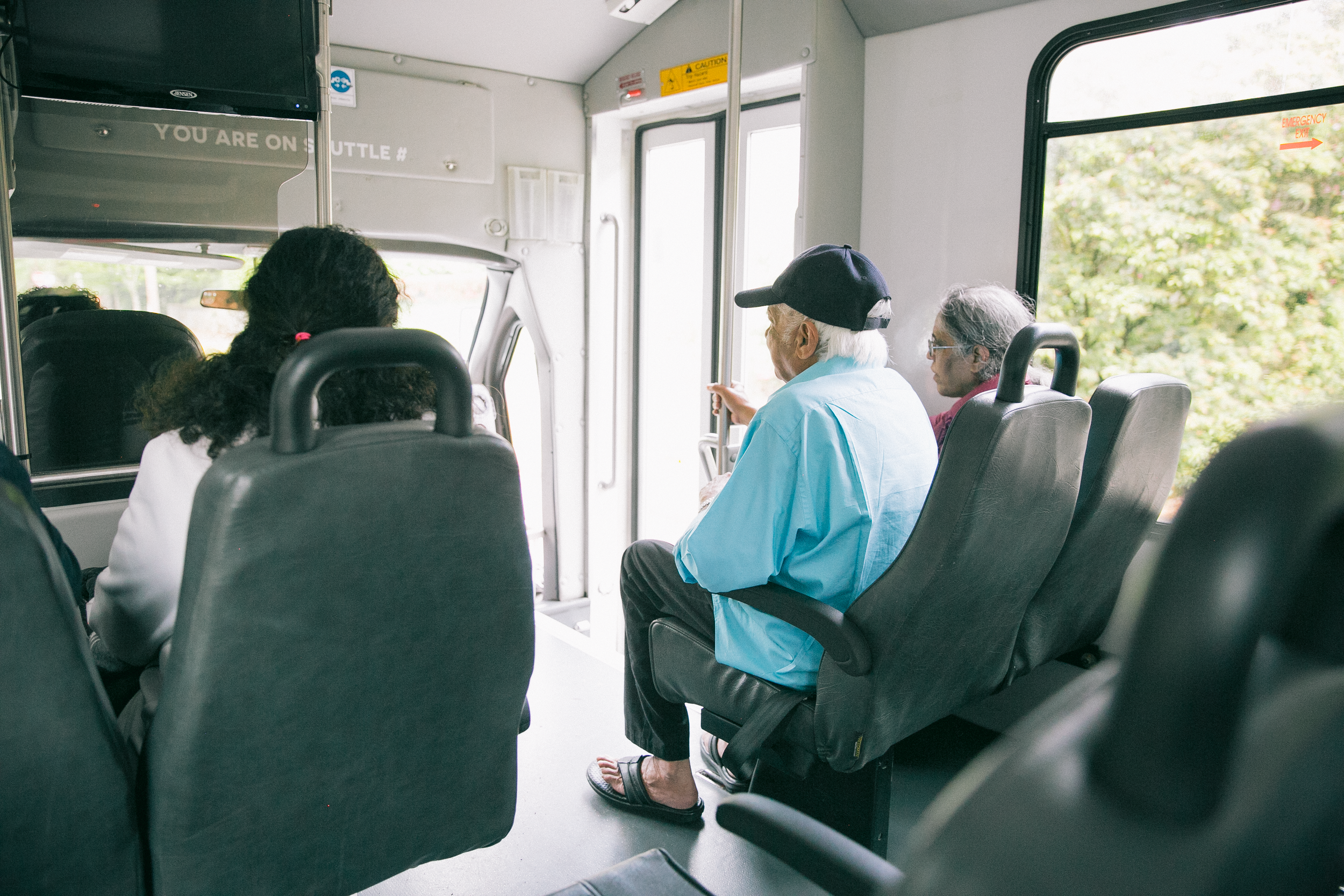 Passengers boarding the Washington Park Free Shuttle Loop bus.