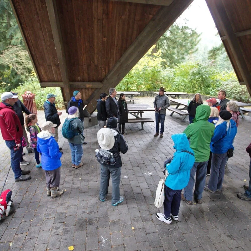  A group gathers for a free guided tour among the trees at Hoyt Arboretum. 
