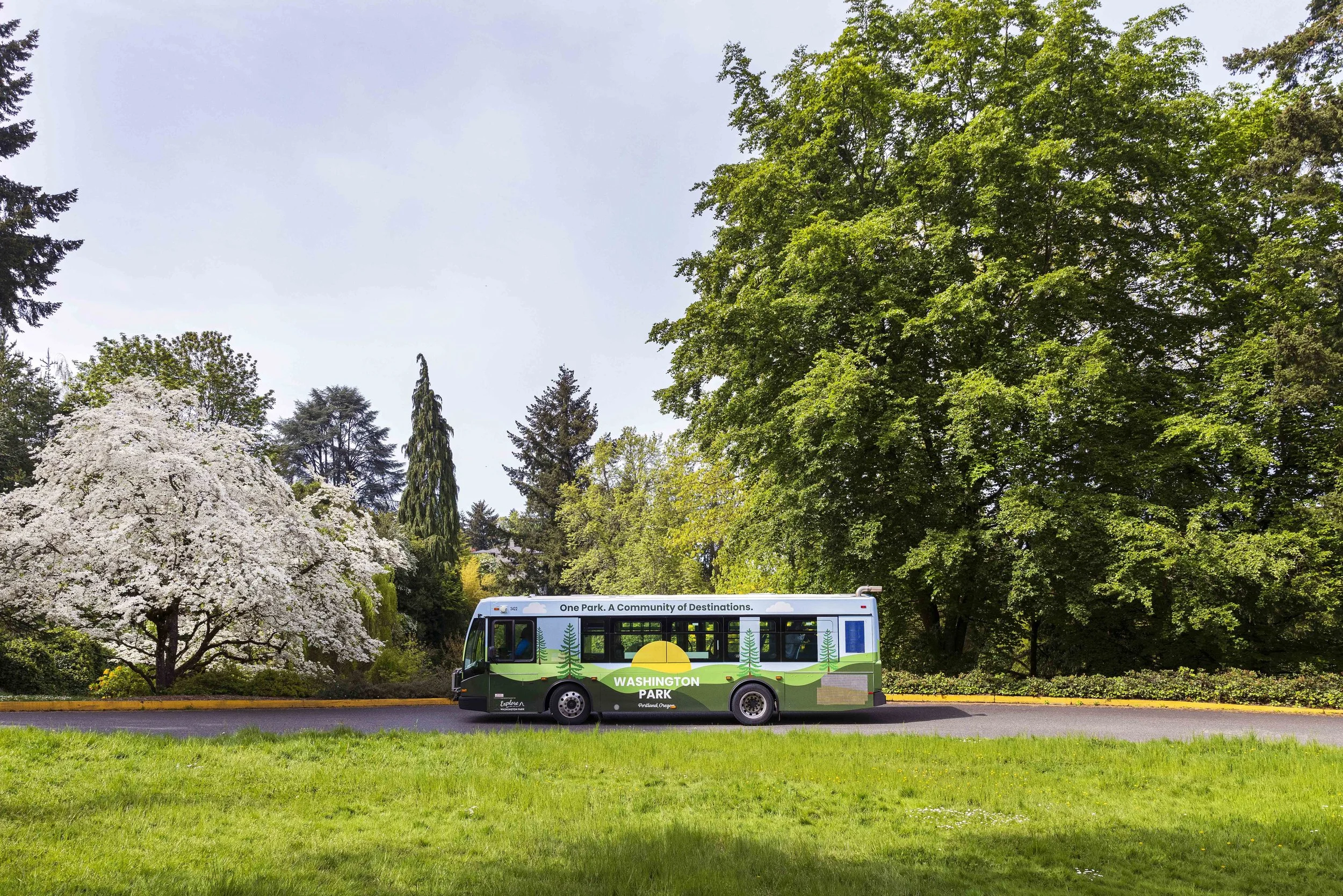 Riders boarding the Washington Park Free Shuttle, next to information about arriving by transit.