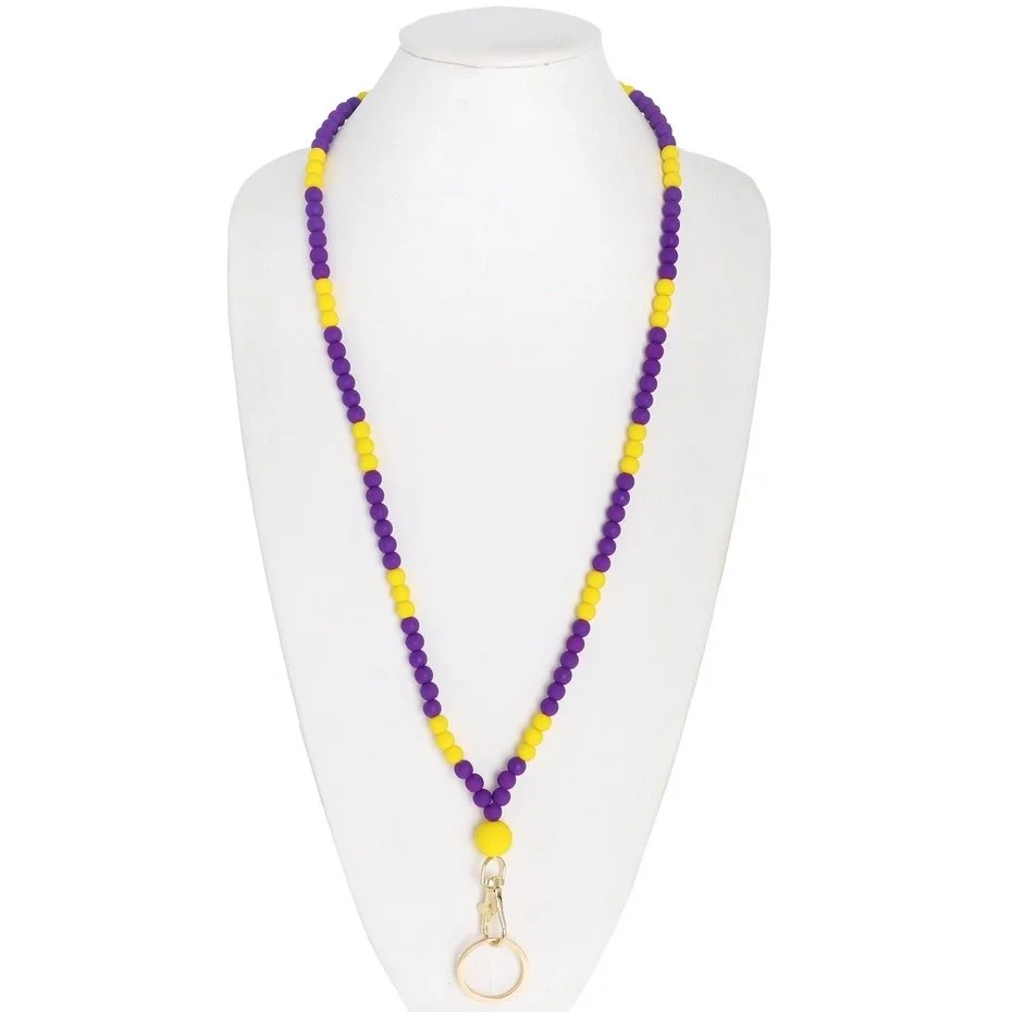 purple + gold badge lanyard