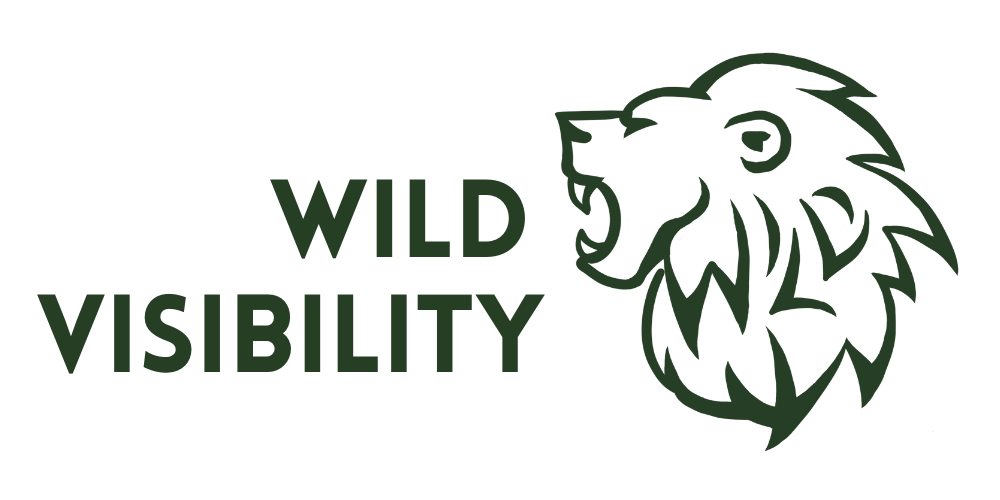 Logo with a lion's head and the text 'Wild Visibility' Marketing Team logo.