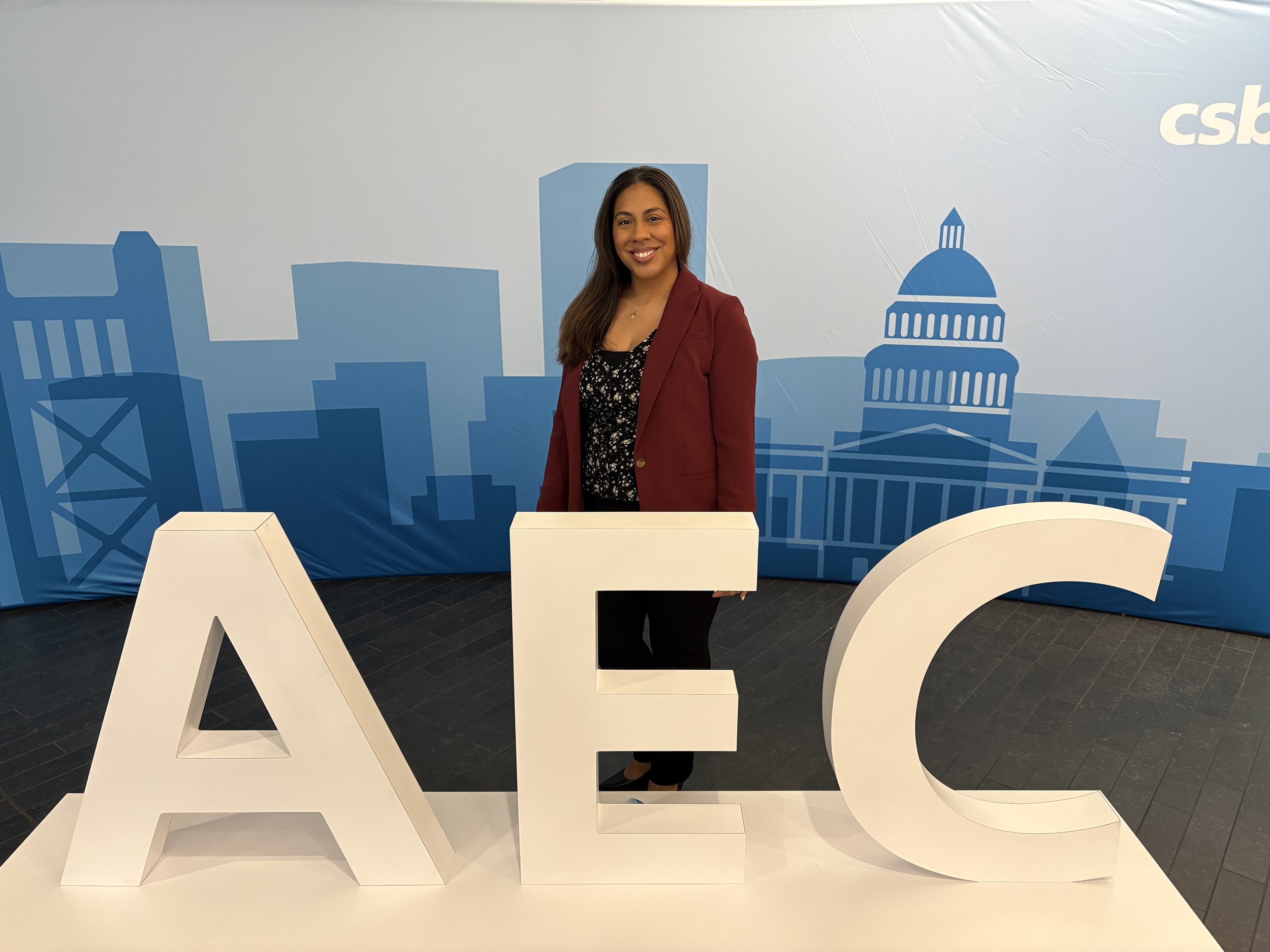 Trustee Delia Baulwin at the AEC conference.