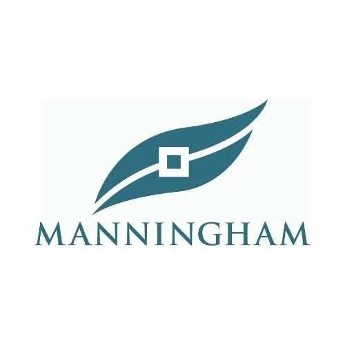 A logo with a stylized leaf design and the word "MANNINGHAM" below it.