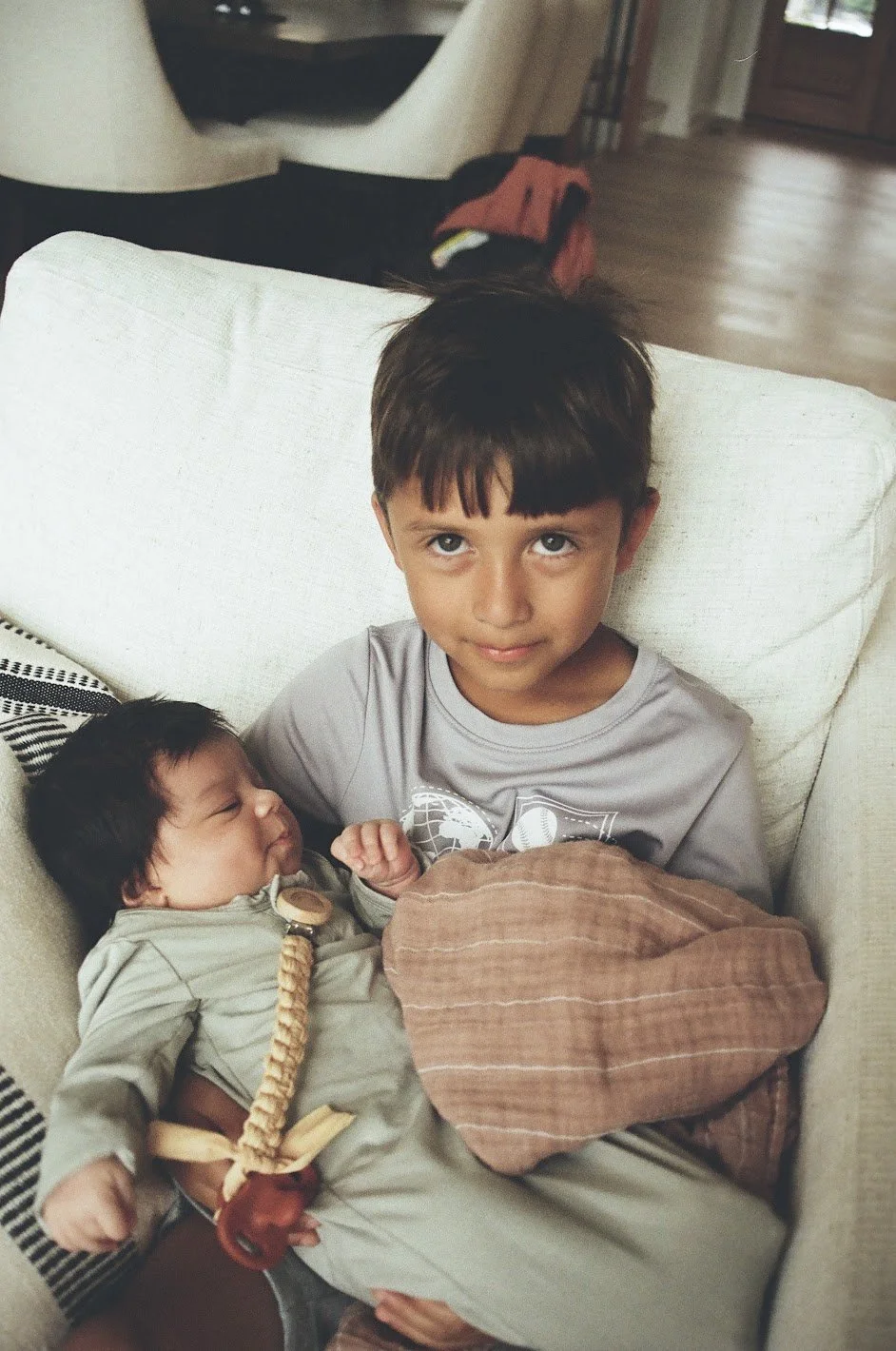 Jaxon holding Elenore.jpeg