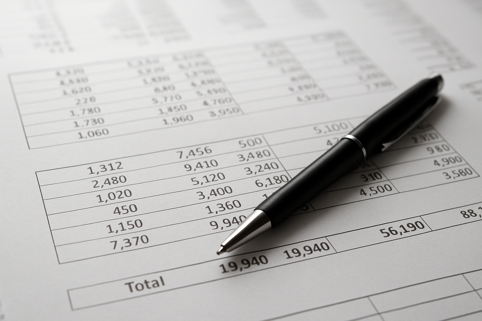 Financial Documents with ballpoint pen