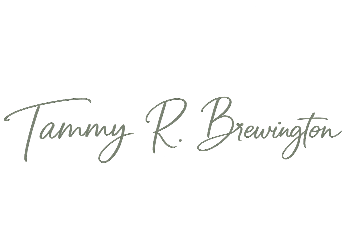 Elegant text logo with the name 'Tammy R. Brewington' written in cursive font on a black background.