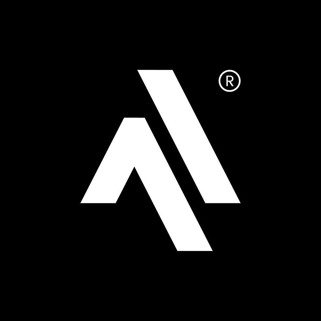 Black background with a white geometric logo featuring an abstract 'A' shape and a small R encased in a circle.