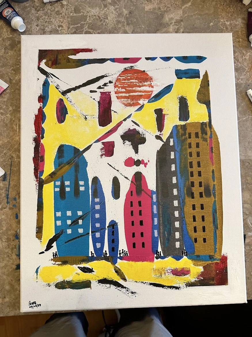 “This piece reimagines an urban skyline through playful abstraction—elongated shapes, bright hues, and textured strokes combine to form a city full of rhythm and character. The rising red sun adds a striking focal point above the geometric chaos.” - 