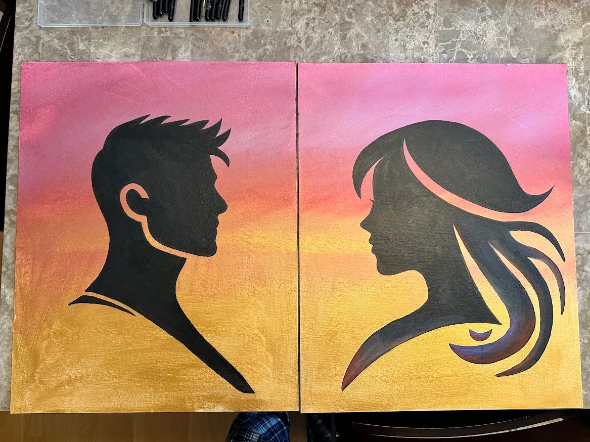 Across the Same Sunset — two-panel acrylic silhouette by Neil Banerjee of a man and woman facing across a gold-to-pink sunset