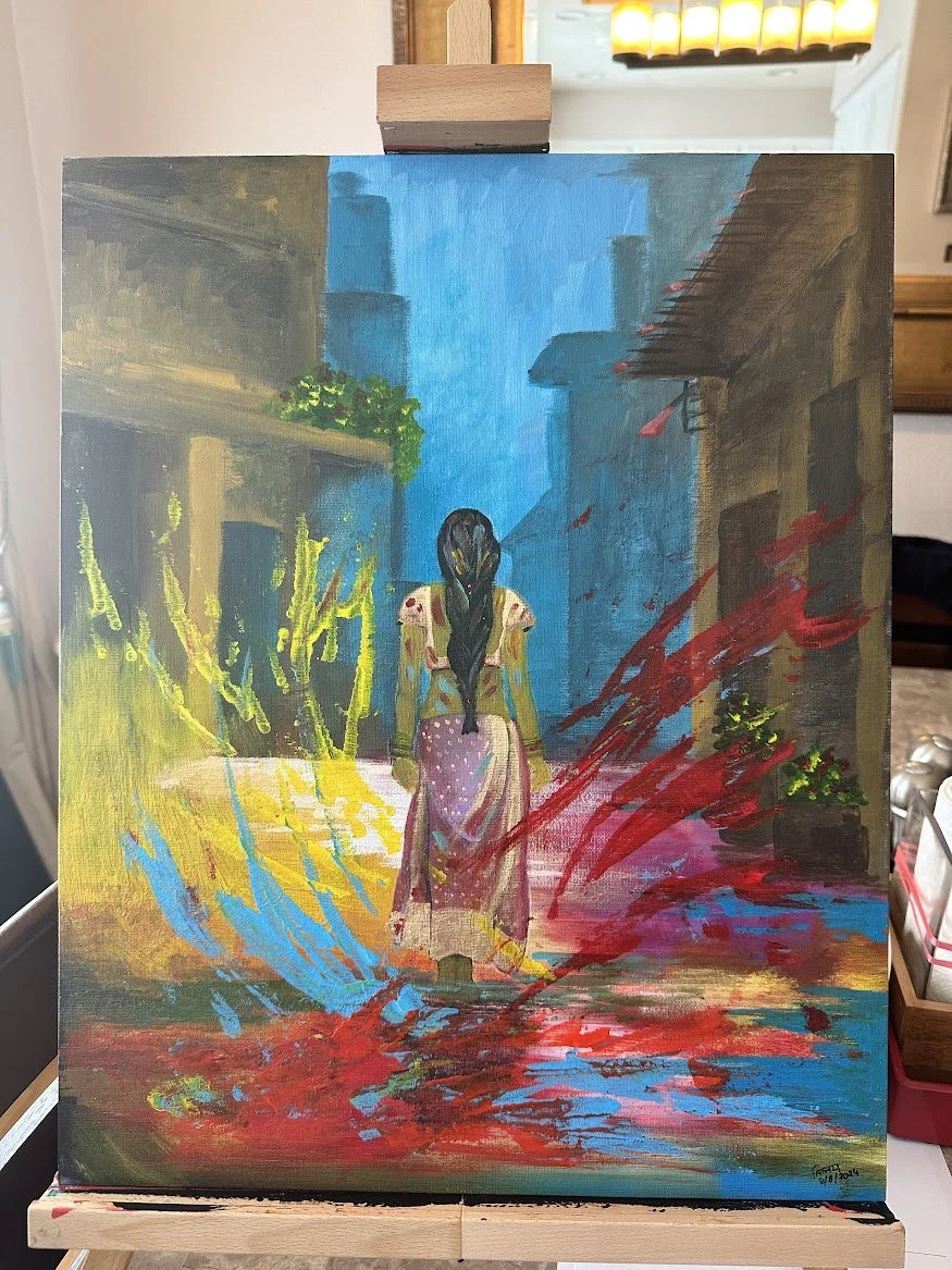 “Set against the narrow lanes of an Indian town, a lone woman walks forward as bursts of Holi color erupt around her. The vibrant chaos contrasts with her quiet resolve, capturing a moment of reflection in the middle of celebration.” - painting by Ne