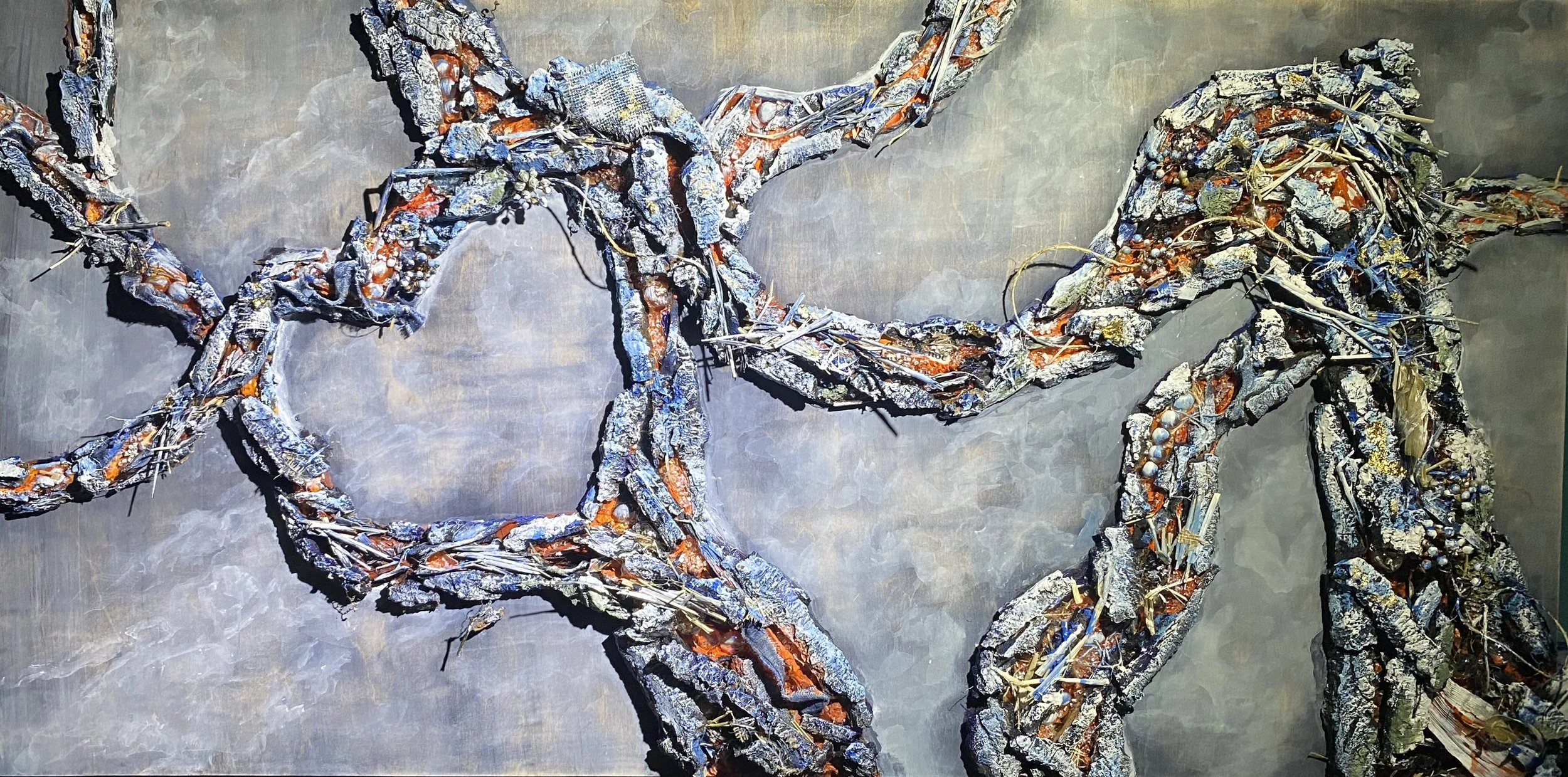PASSAGE, 2023
acrylic, bark, milo, clear glue, leaves, fungus, paper, husk, denim, toothpicks, spackle, ink on wood panel
24" x 48" x 3.25"