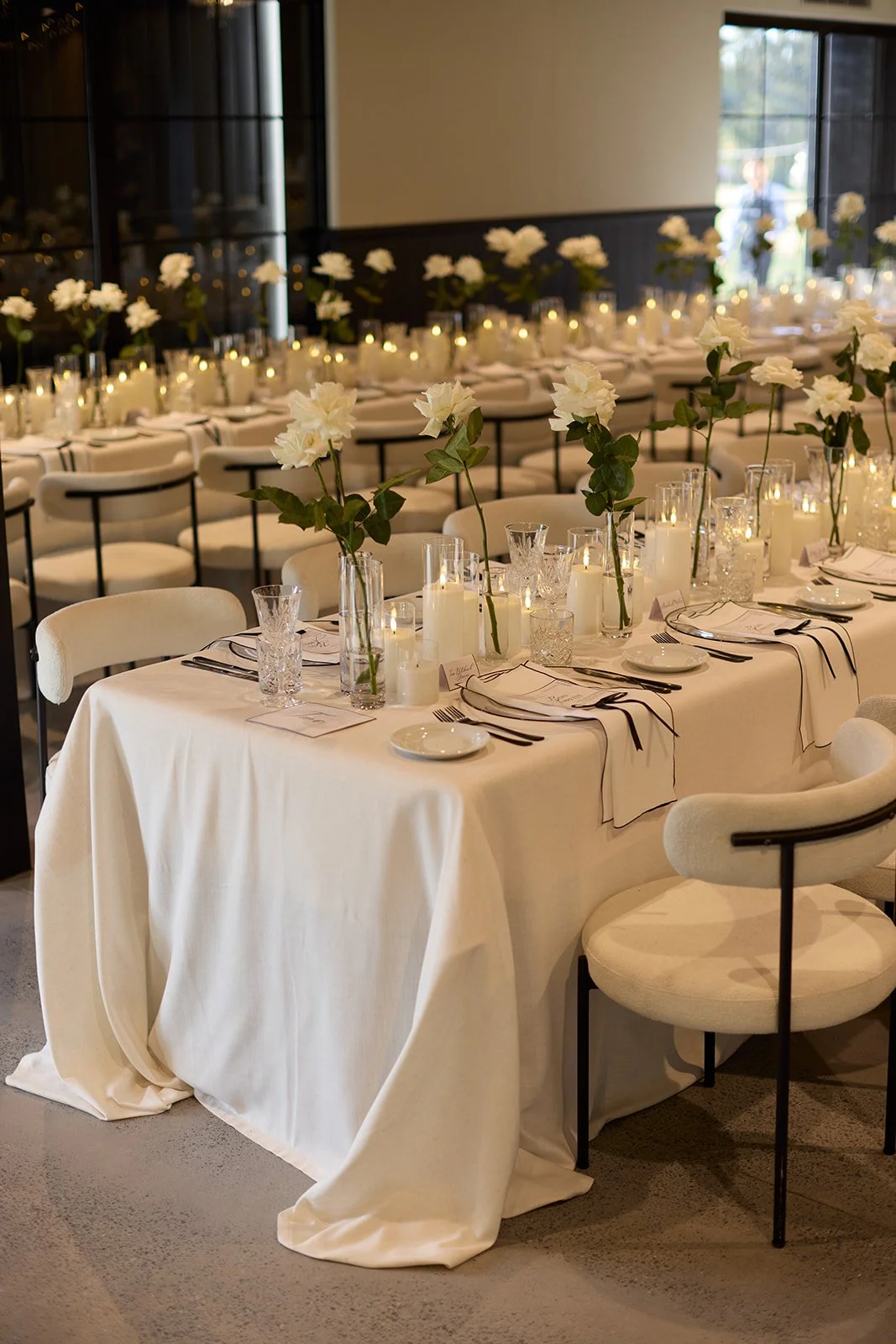 Collage of elegant dining room setups with floral centerpieces, candles, and stylish table settings in various refined interior spaces.