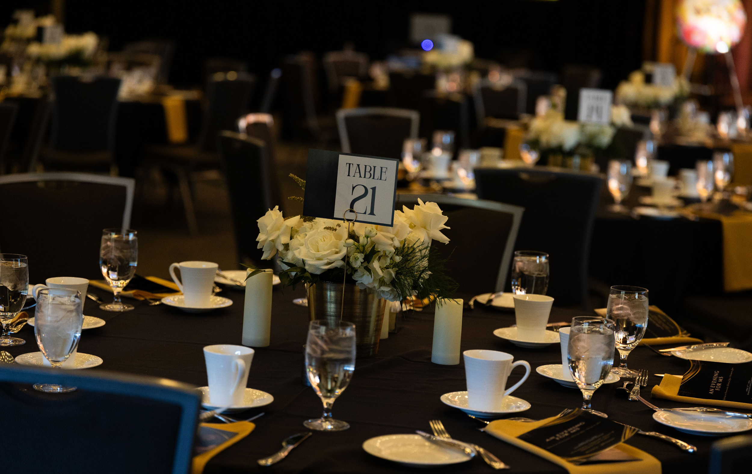 Table decor and floral arrangements at the MS Nation gala fundraiser