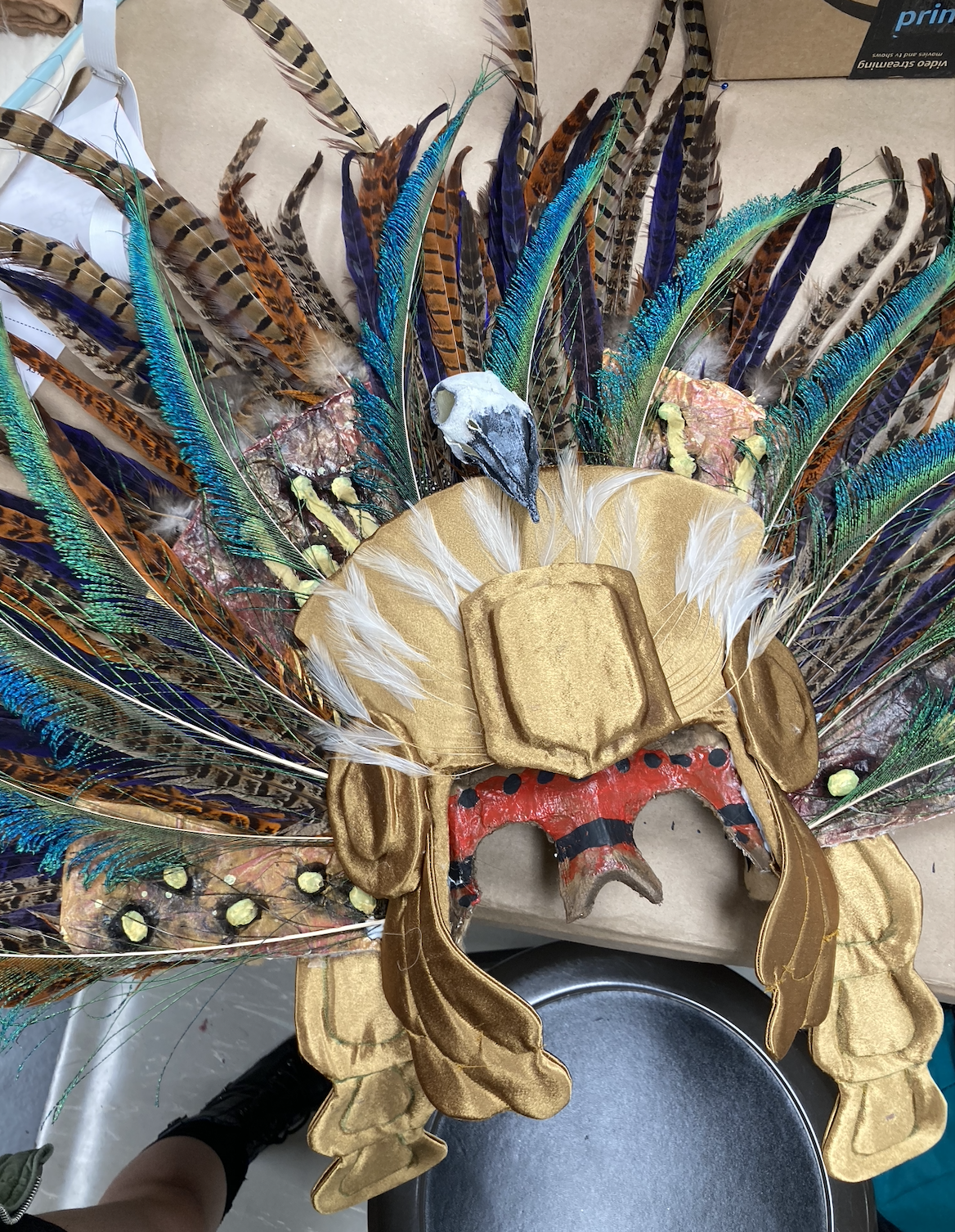 Close up of Penacho detail. Gold embellishment made with Fosshape and wrapped in gold satin.