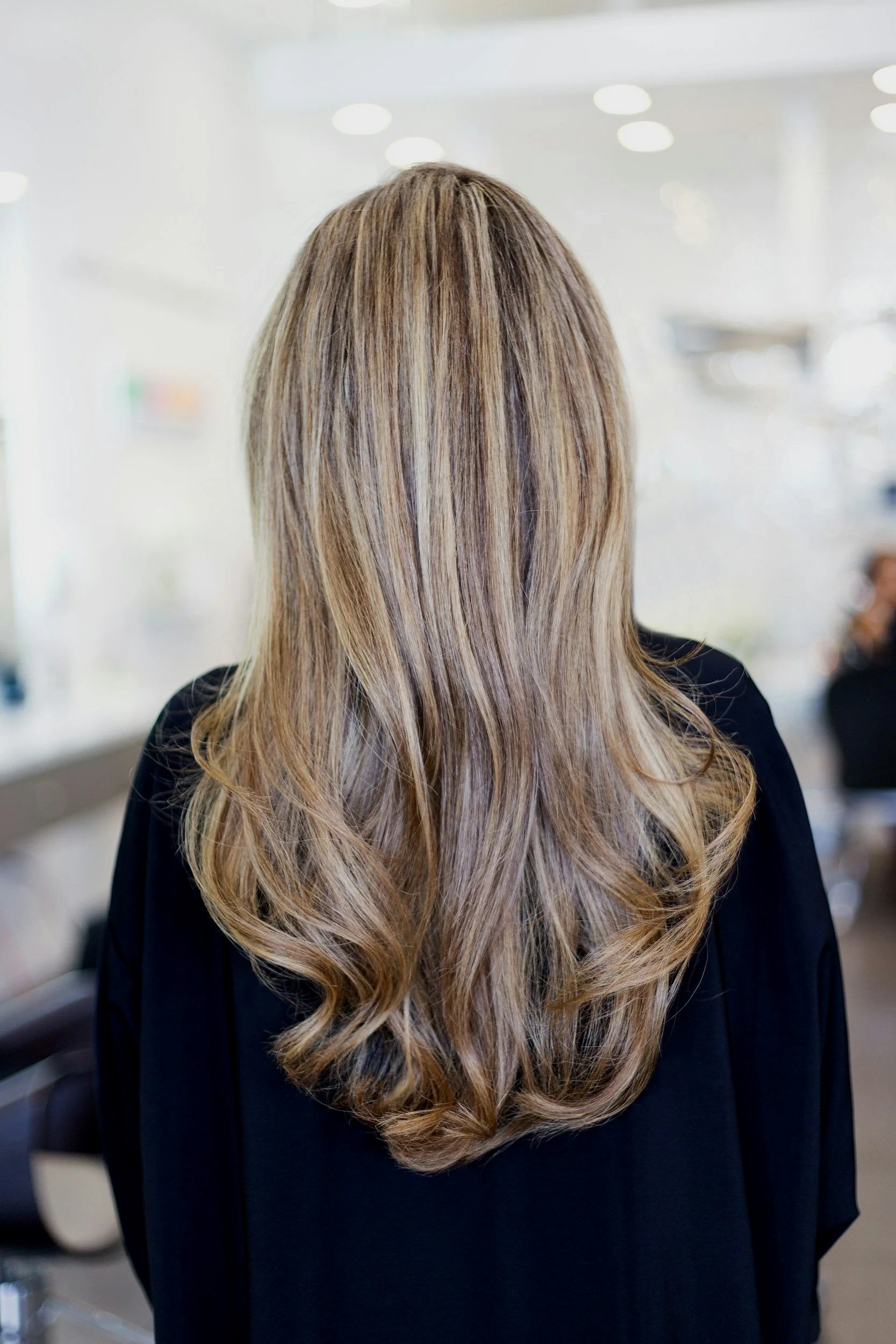 Luxury hair extension installation at The Emerald Salon in Akron OH