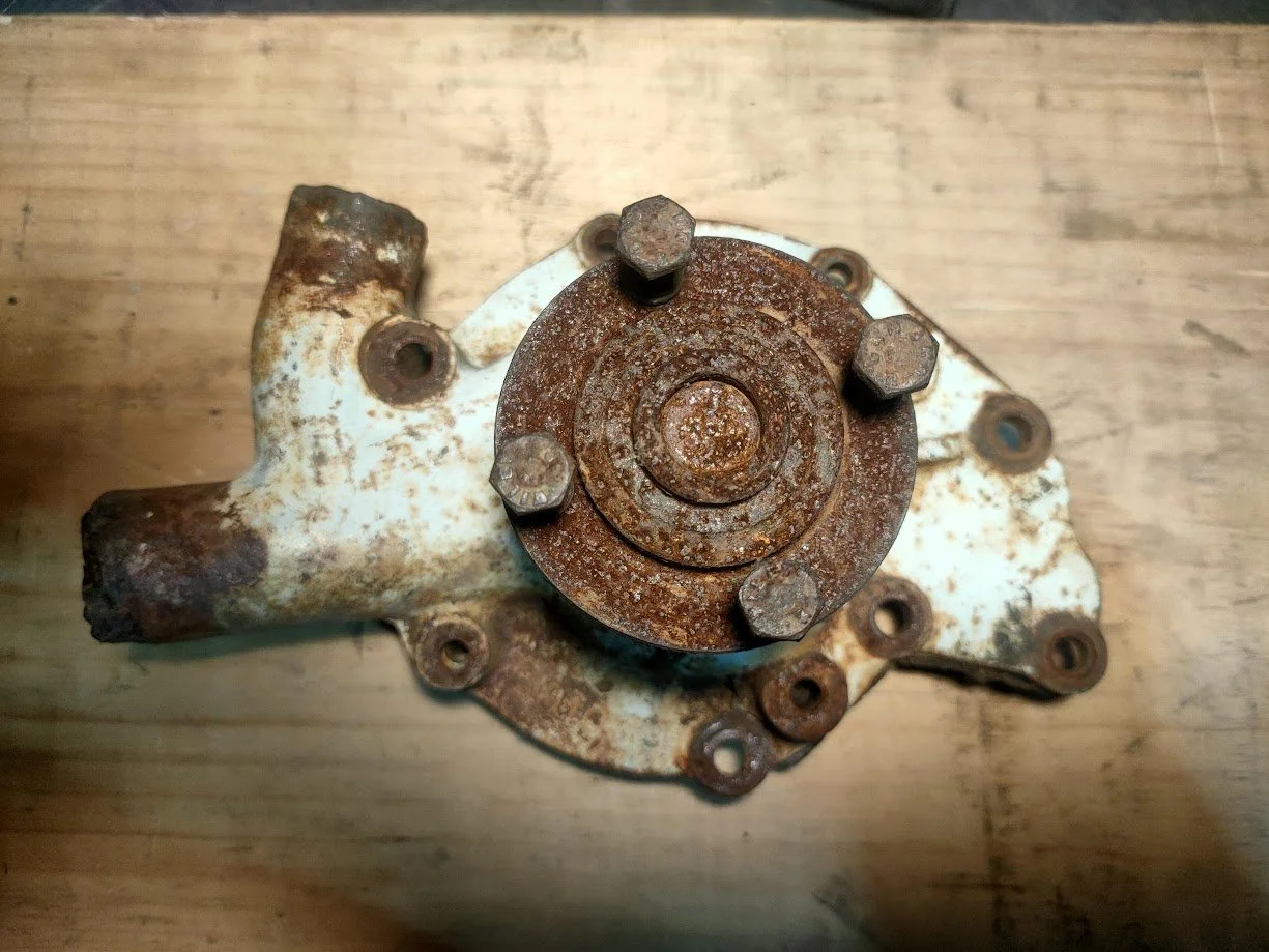 Early 2.25 water pumps (8 mount bolt holes)